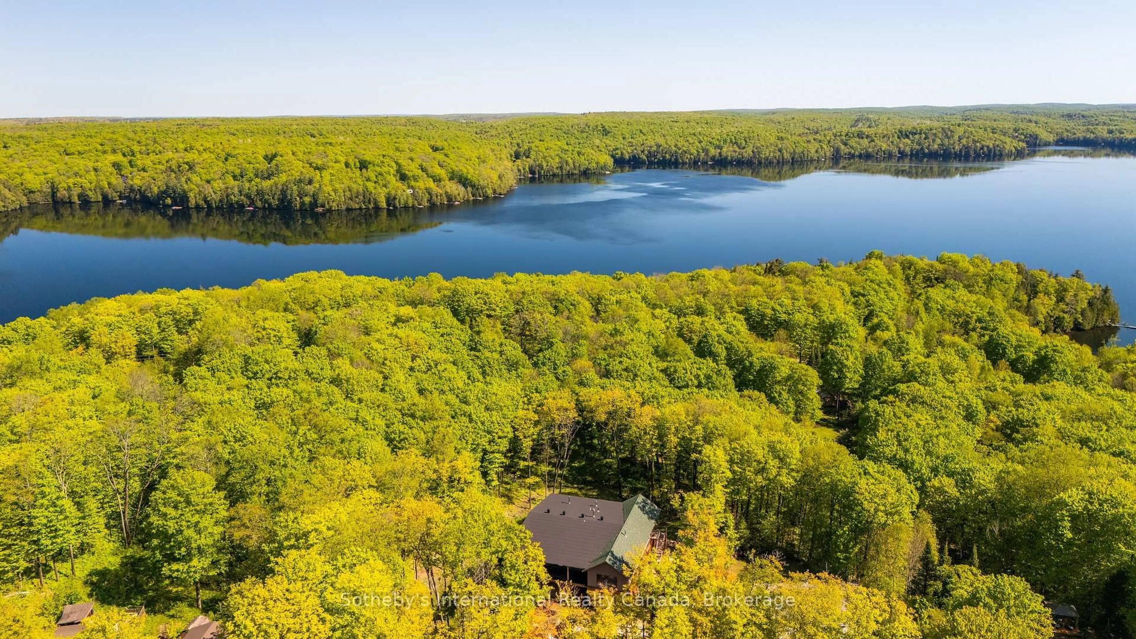 A pic from outside/outdoor area/front of a property/back of a property/a pic from drone, water/lake/river/ocean view for 1739 Trapper's Trail Rd, Dysart et al Ontario K0M 1S0
