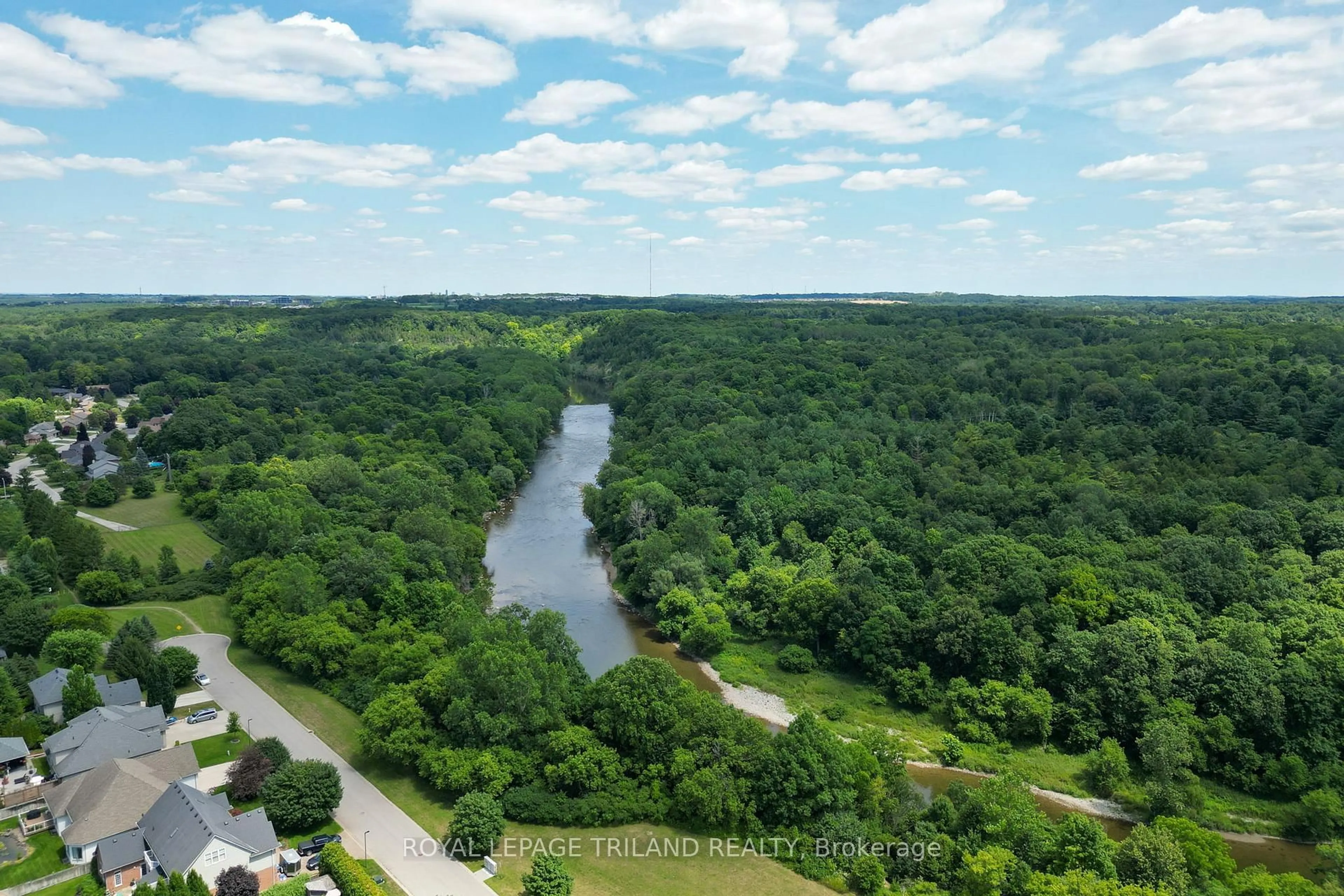 A pic from outside/outdoor area/front of a property/back of a property/a pic from drone, water/lake/river/ocean view for 45 Stephen Moore Dr, Middlesex Centre Ontario N0L 1R0