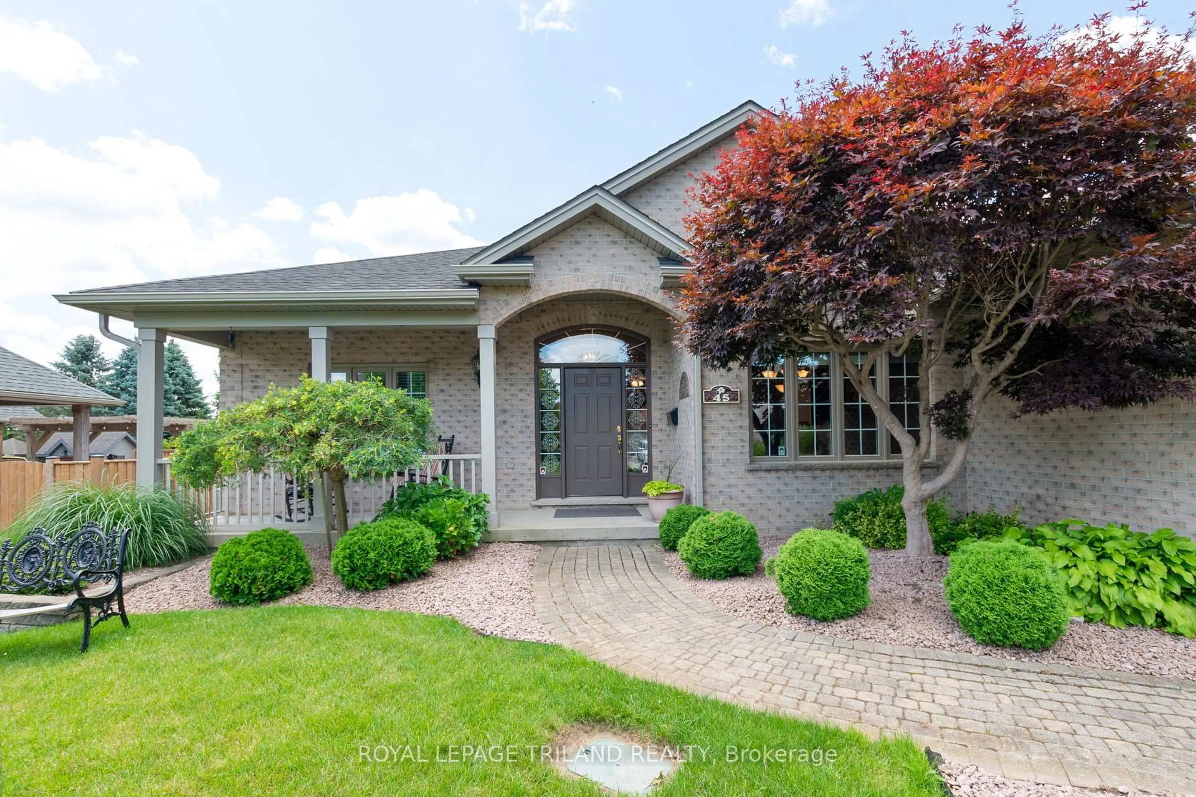 Home with brick exterior material, street for 45 Stephen Moore Dr, Middlesex Centre Ontario N0L 1R0