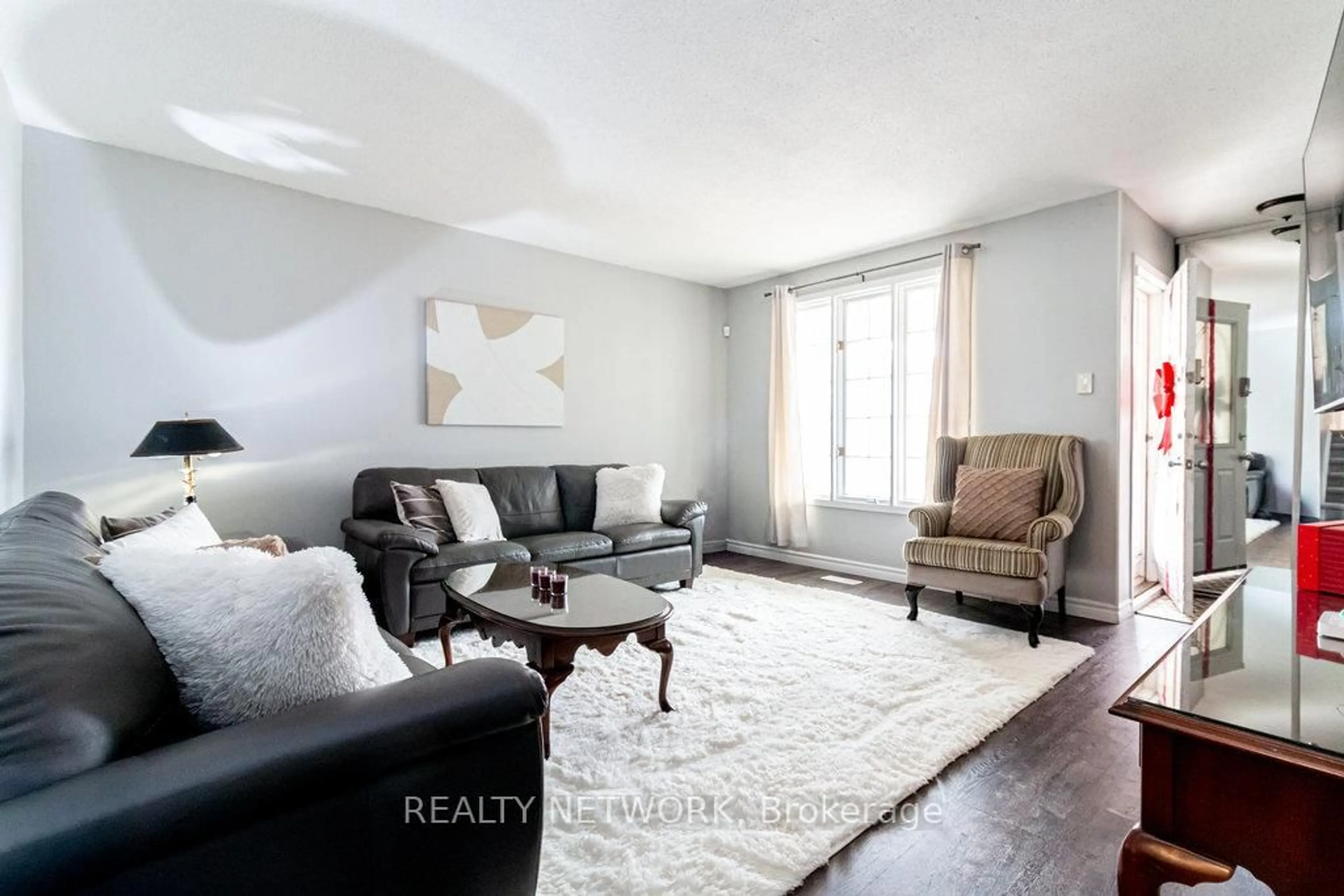 Living room with furniture, unknown for 48 Arbutus Cres, Hamilton Ontario L8J 1M8