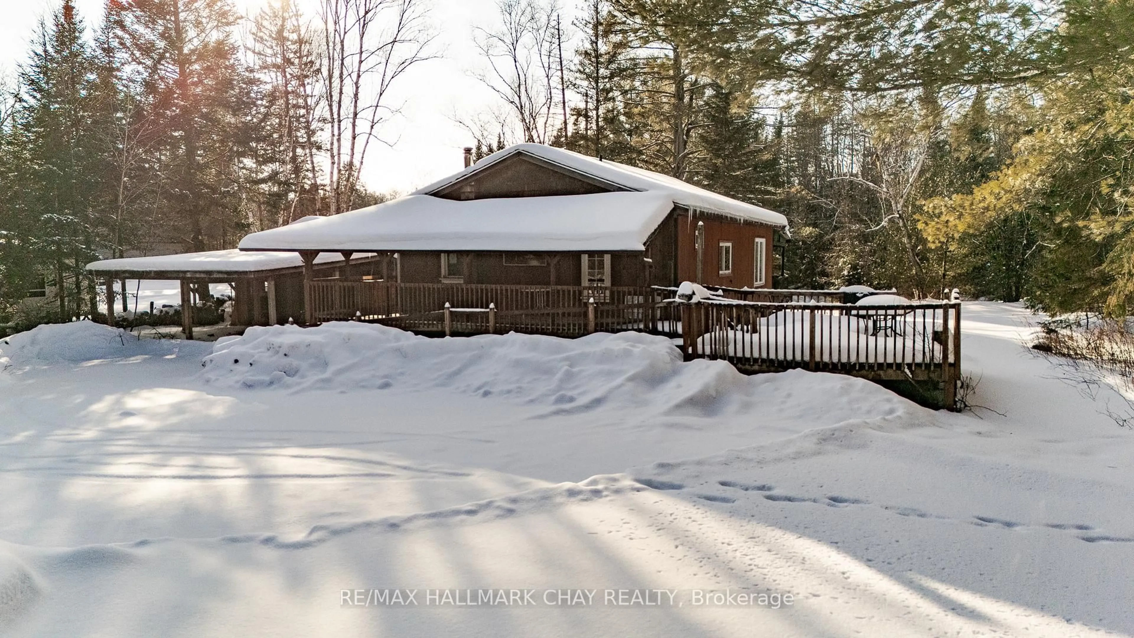 A pic from outside/outdoor area/front of a property/back of a property/a pic from drone, unknown for 24 Robert Rd, Huntsville Ontario P1H 2J4