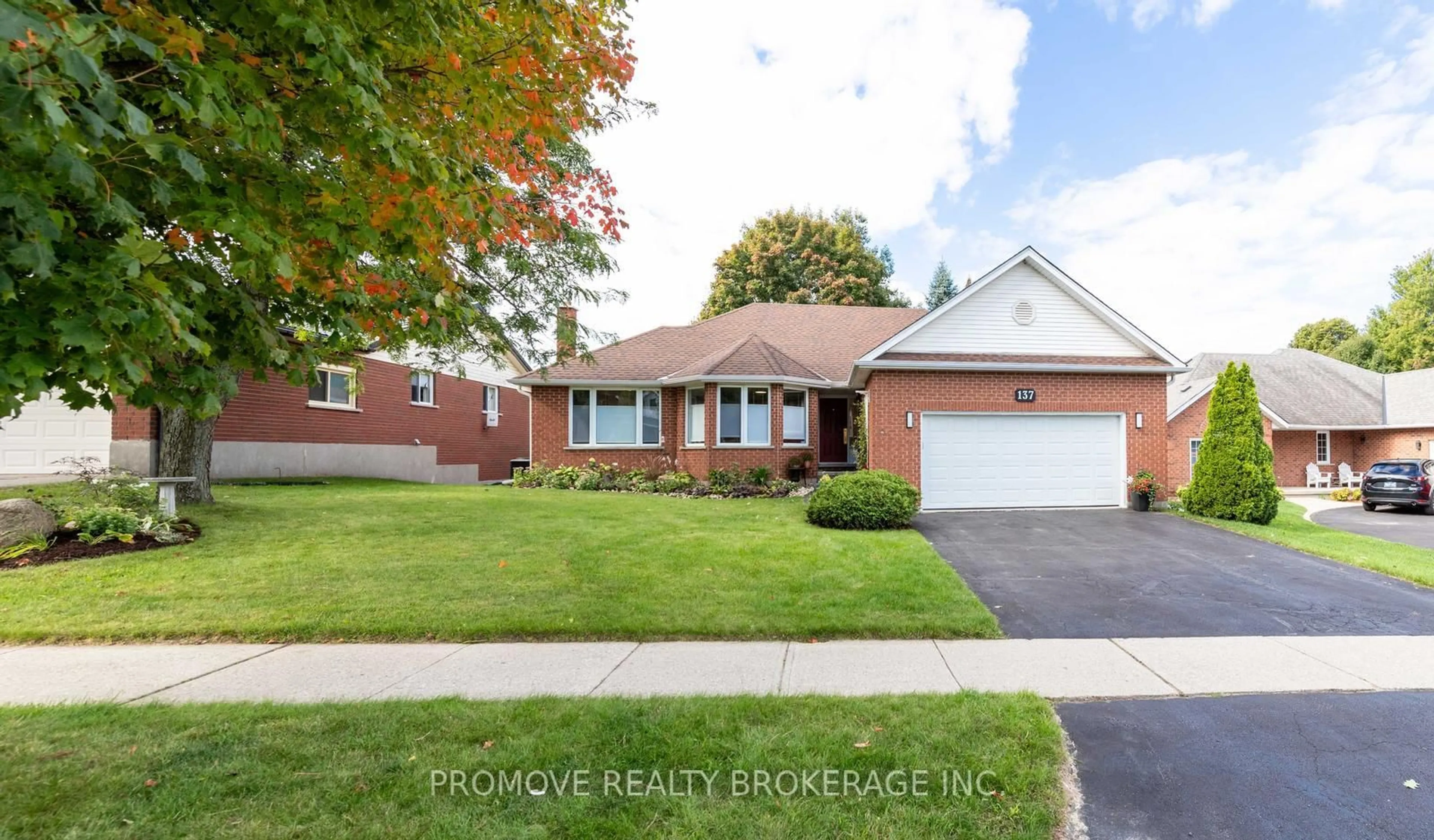 Home with brick exterior material, street for 137 Lou's Blvd, Guelph/Eramosa Ontario N0B 2K0