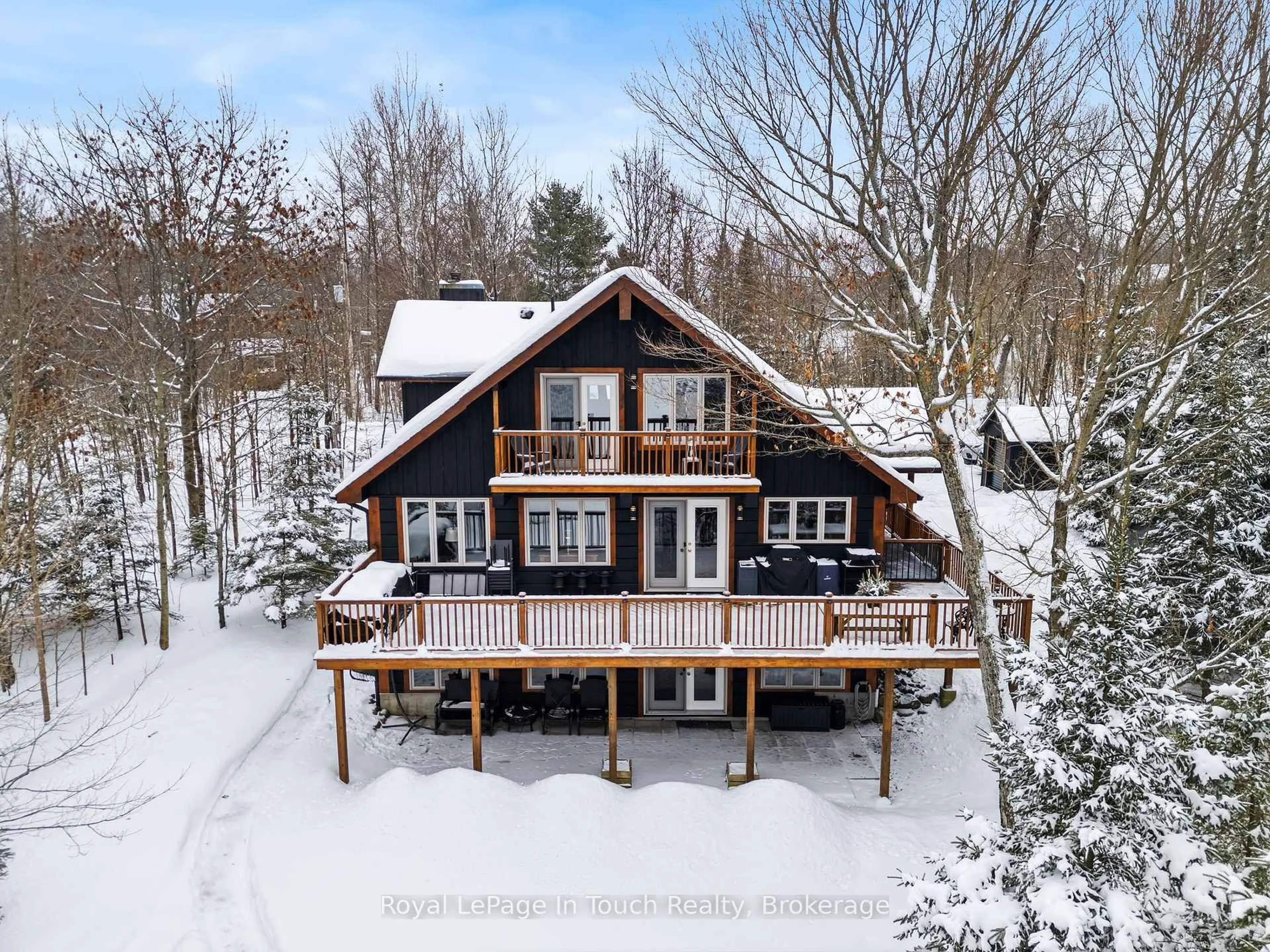 A pic from outside/outdoor area/front of a property/back of a property/a pic from drone, water/lake/river/ocean view for 267 Burnetts Rd, McKellar Ontario P2A 0B5