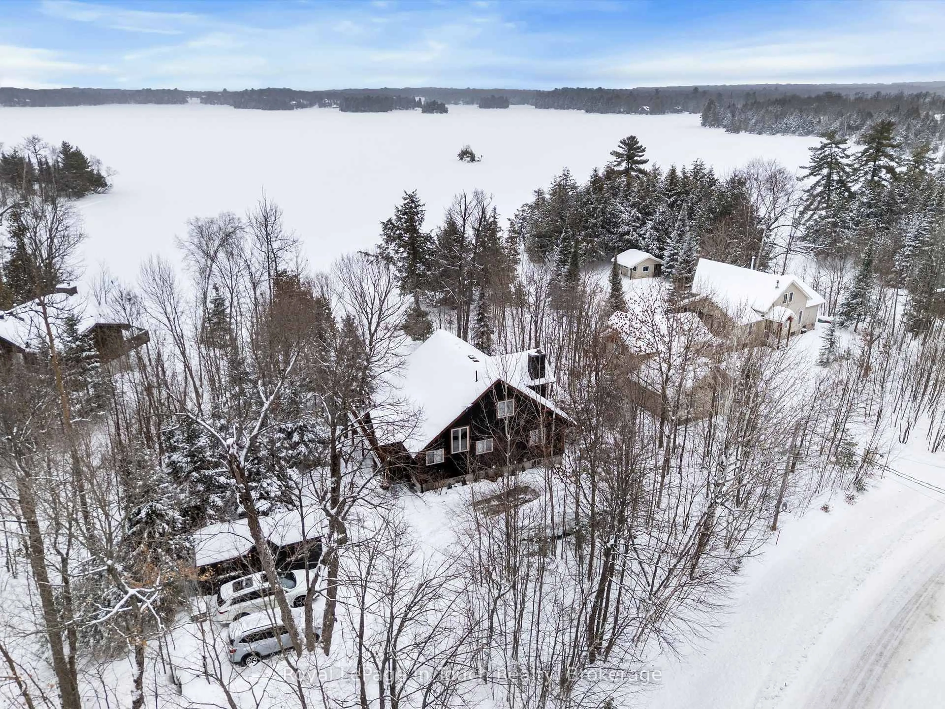 A pic from outside/outdoor area/front of a property/back of a property/a pic from drone, water/lake/river/ocean view for 267 Burnetts Rd, McKellar Ontario P2A 0B5