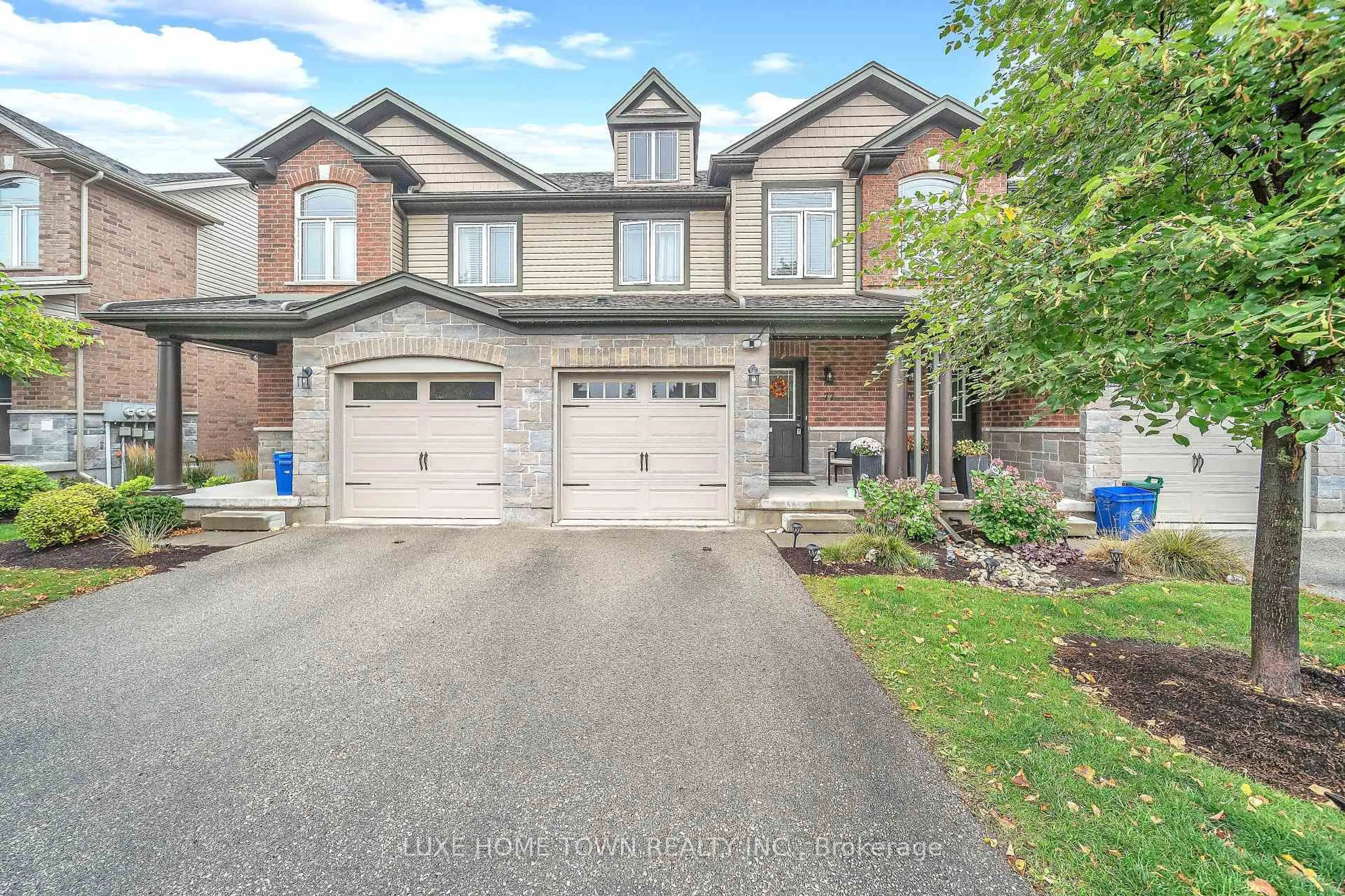 Home with brick exterior material, street for 77 Westminster Cres #68, Centre Wellington Ontario N1M 0C4