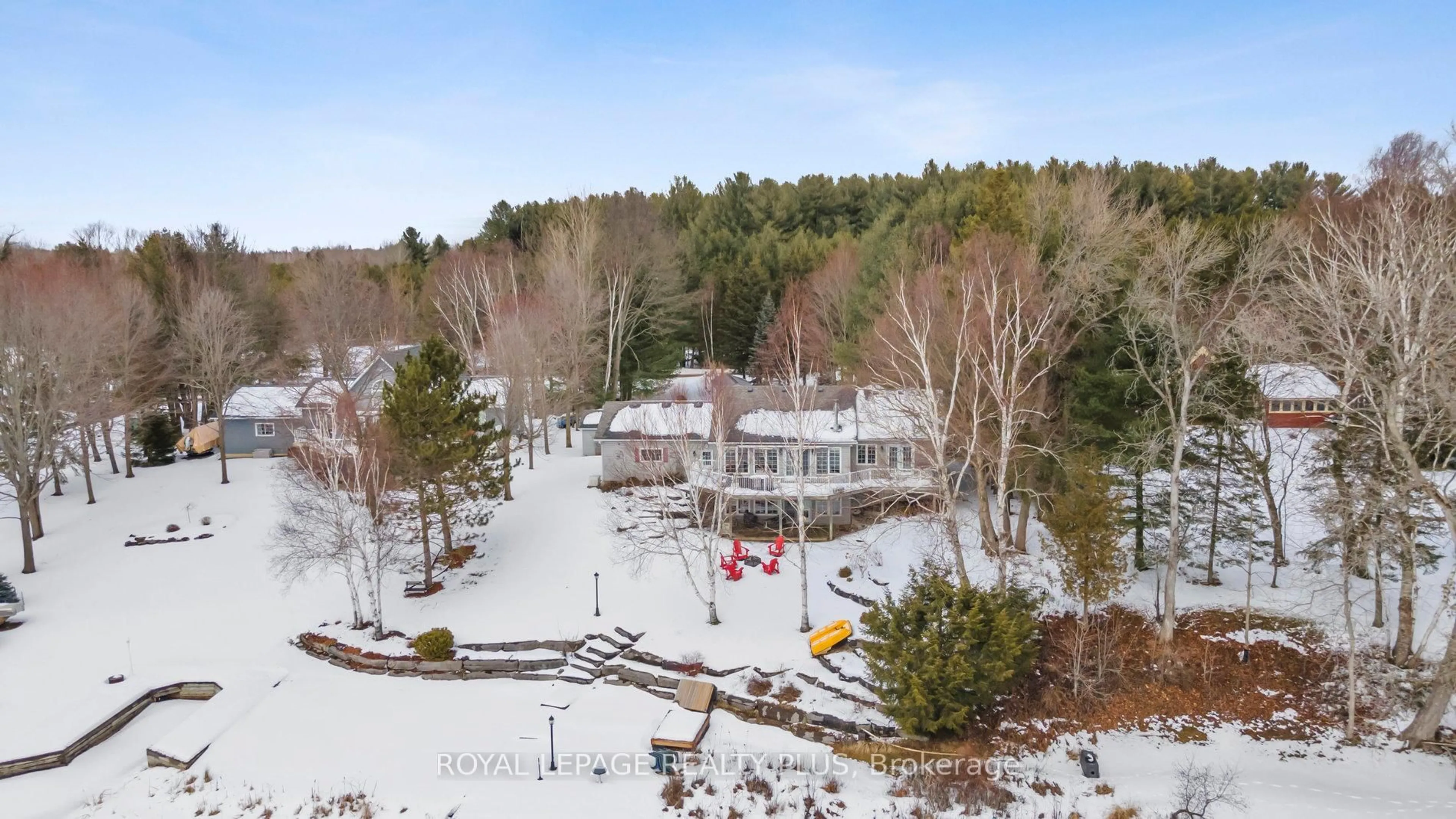 A pic from outside/outdoor area/front of a property/back of a property/a pic from drone, mountain view for 16 Black Bear Dr, Kawartha Lakes Ontario K0M 1N0