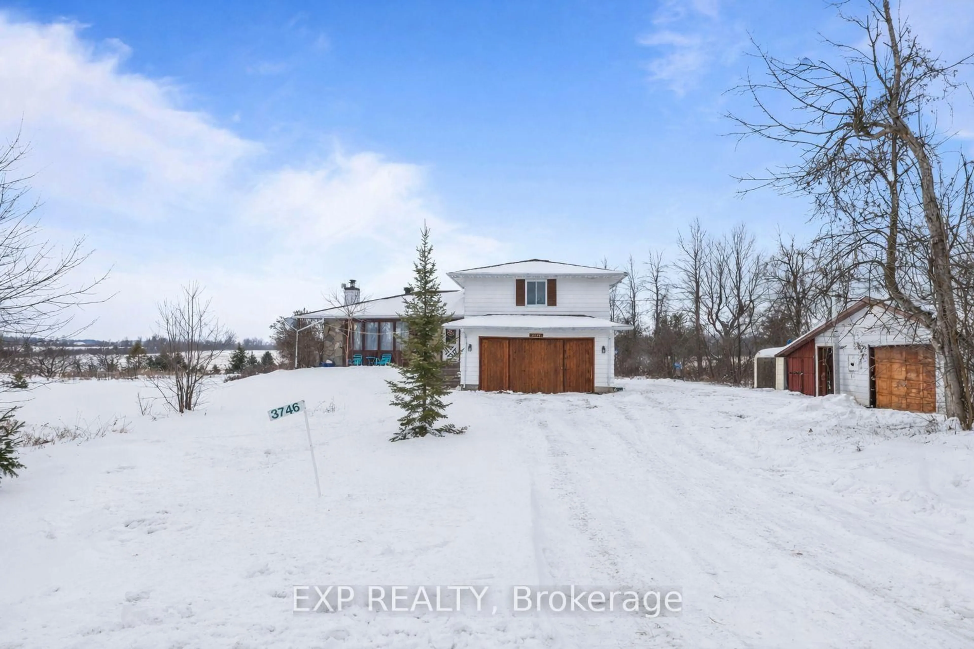 A pic from outside/outdoor area/front of a property/back of a property/a pic from drone, unknown for 3746 campbellcroft Rd, Osgoode Ontario K0A 2W0