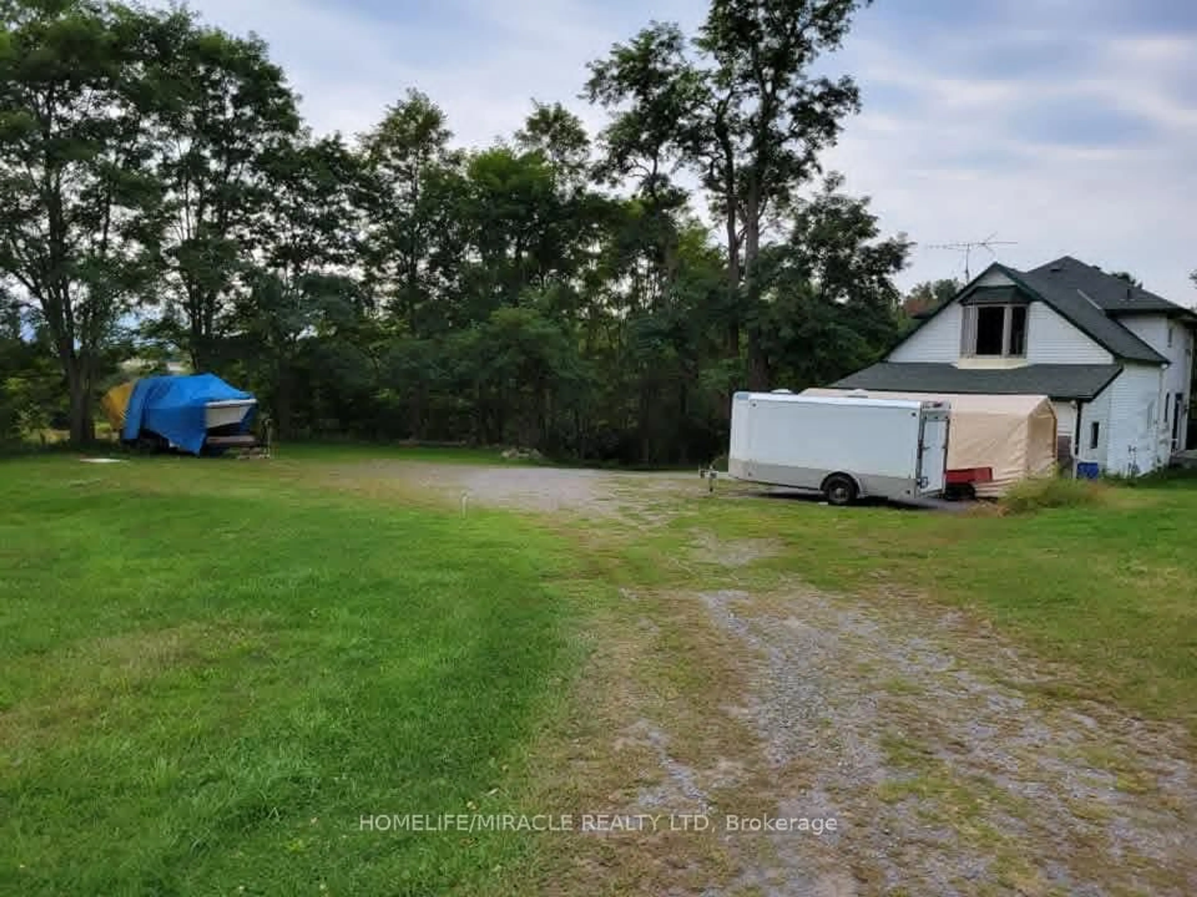 A pic from outside/outdoor area/front of a property/back of a property/a pic from drone, water/lake/river/ocean view for 979 County Rd 30 Rd, Brighton Ontario K0K 1H0
