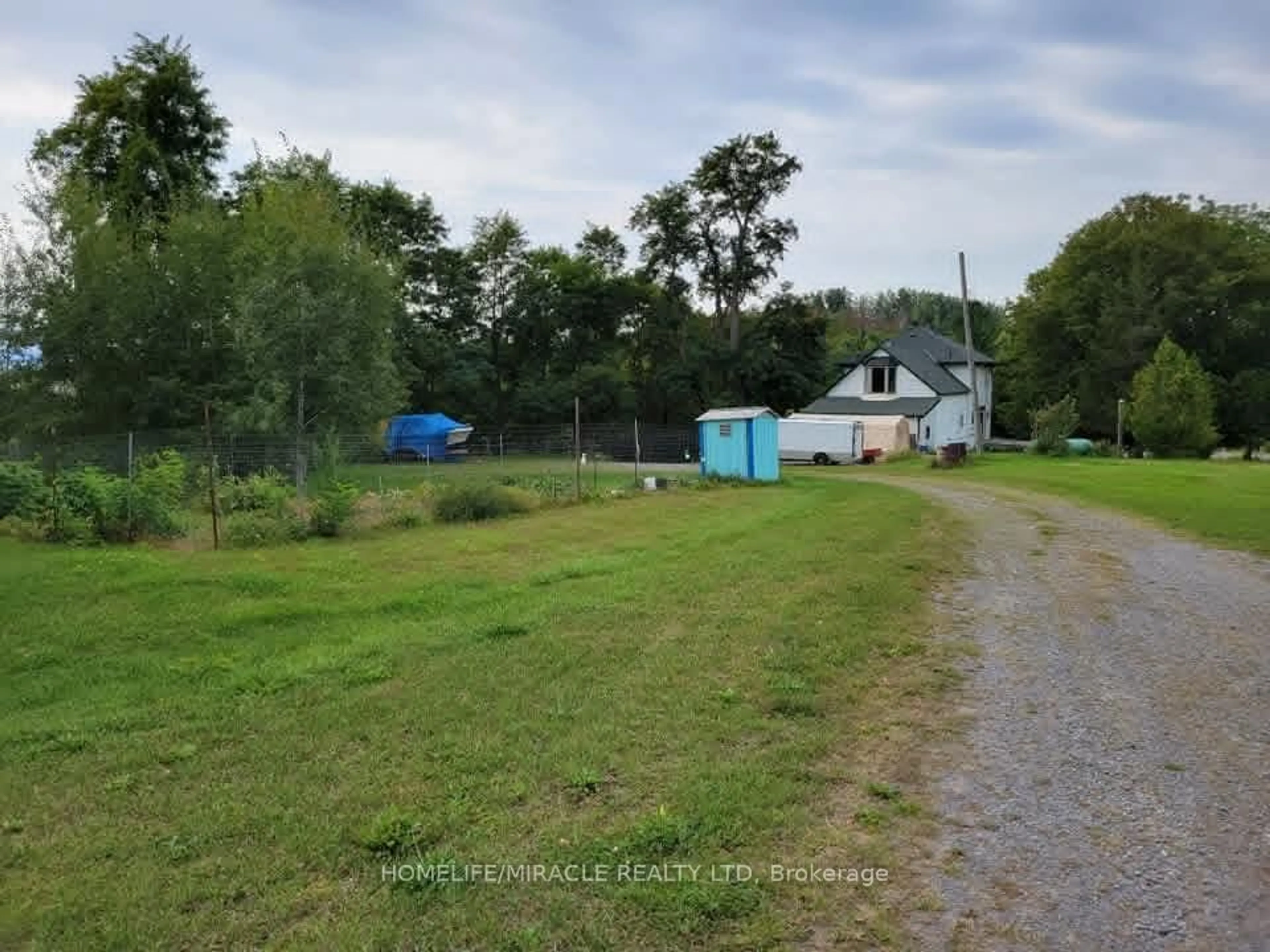 A pic from outside/outdoor area/front of a property/back of a property/a pic from drone, street for 979 County Rd 30 Rd, Brighton Ontario K0K 1H0