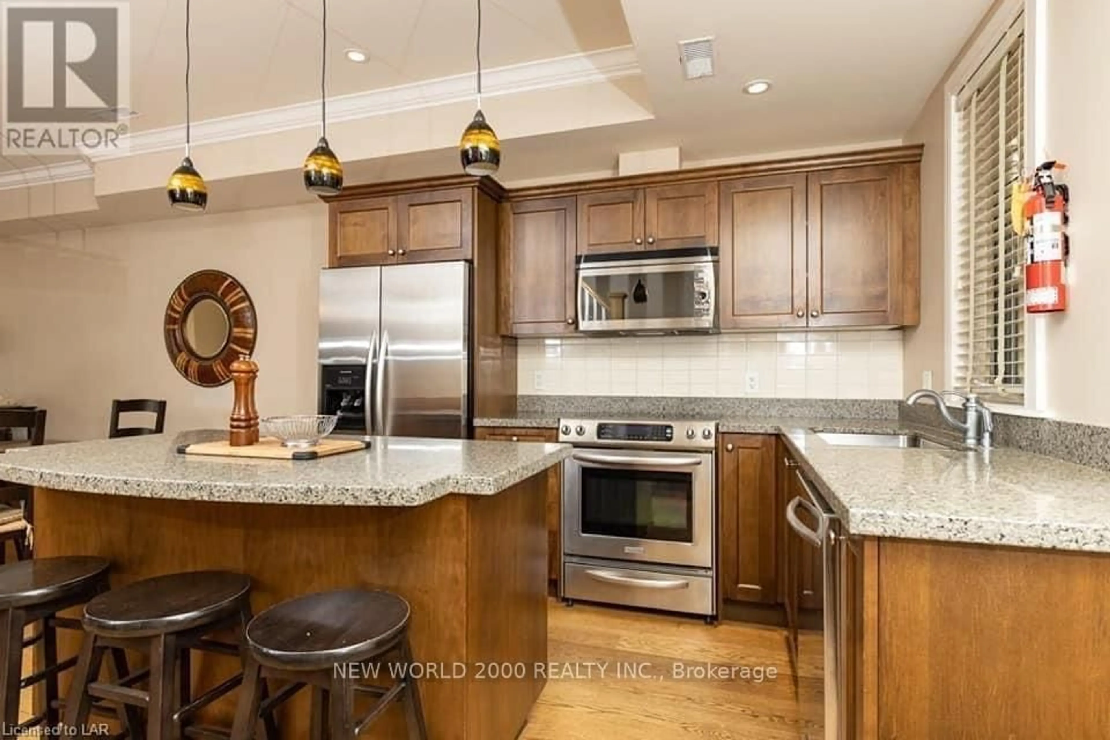 Open concept kitchen, ceramic/tile floor for 302 Emerald Hills Crt #12, Seguin Ontario P0C 1H0