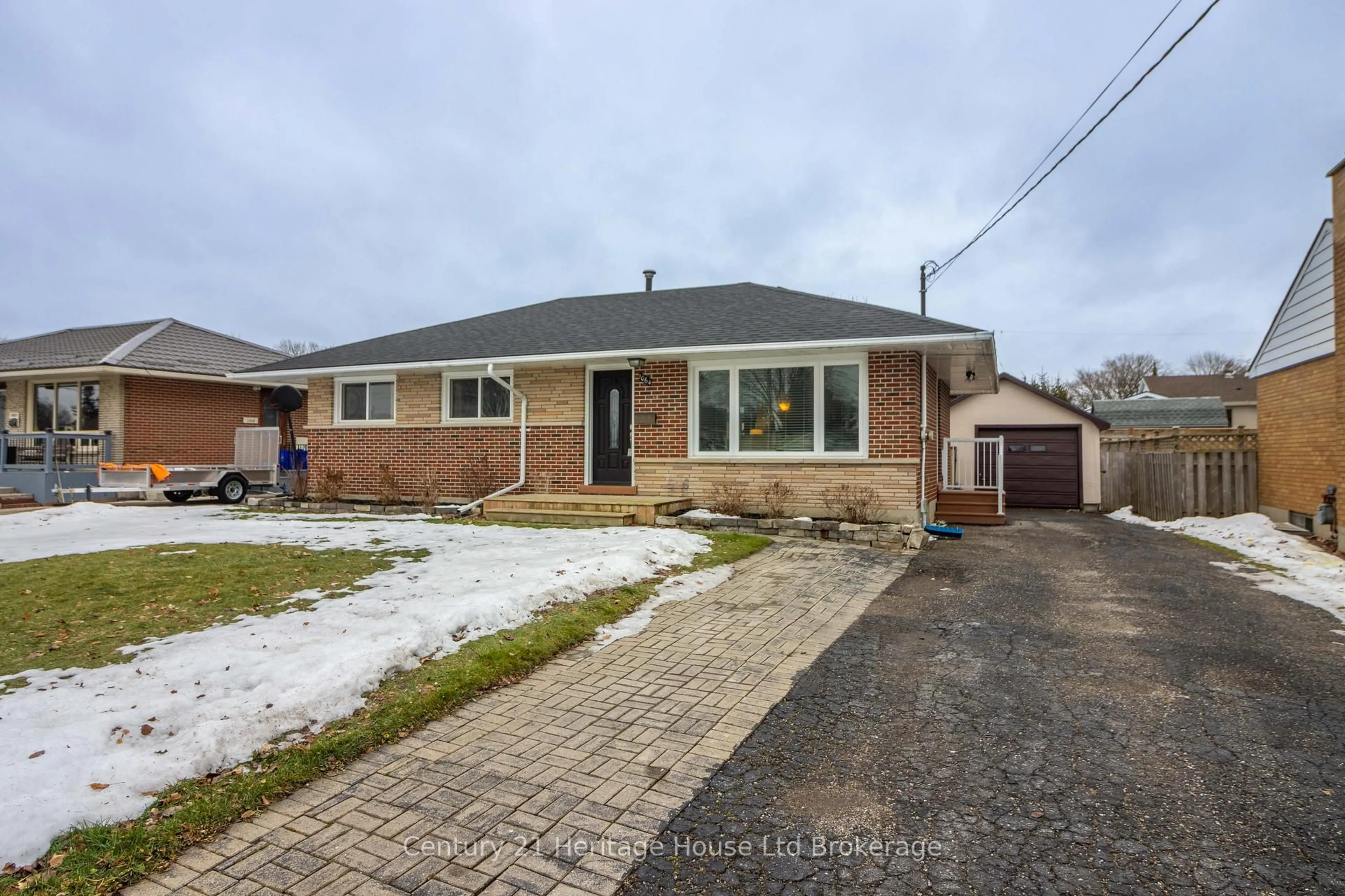 Home with brick exterior material, street for 1064 Sovereign Rd, Woodstock Ontario N4S 5P2