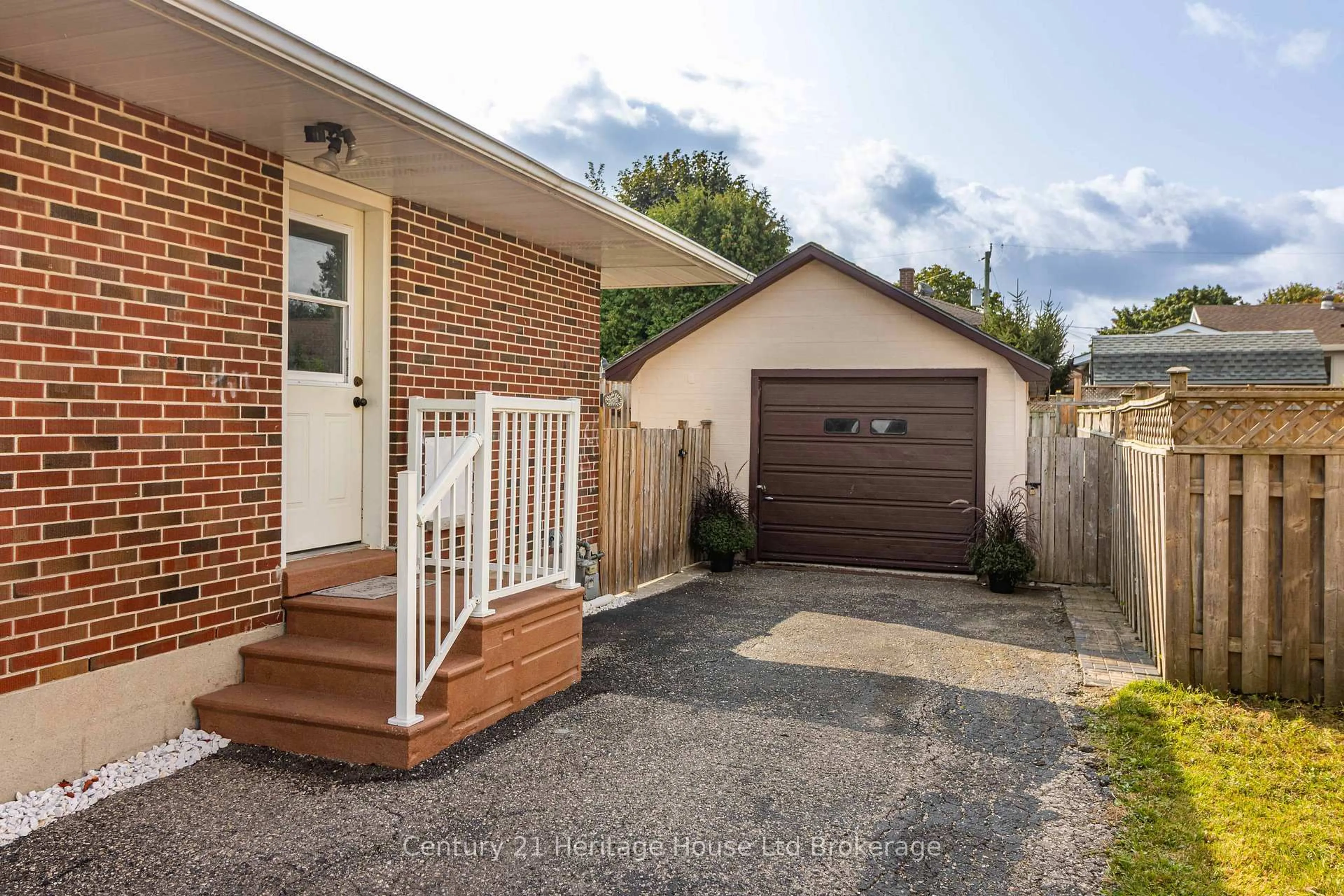 Home with brick exterior material, street for 1064 Sovereign Rd, Woodstock Ontario N4S 5P2