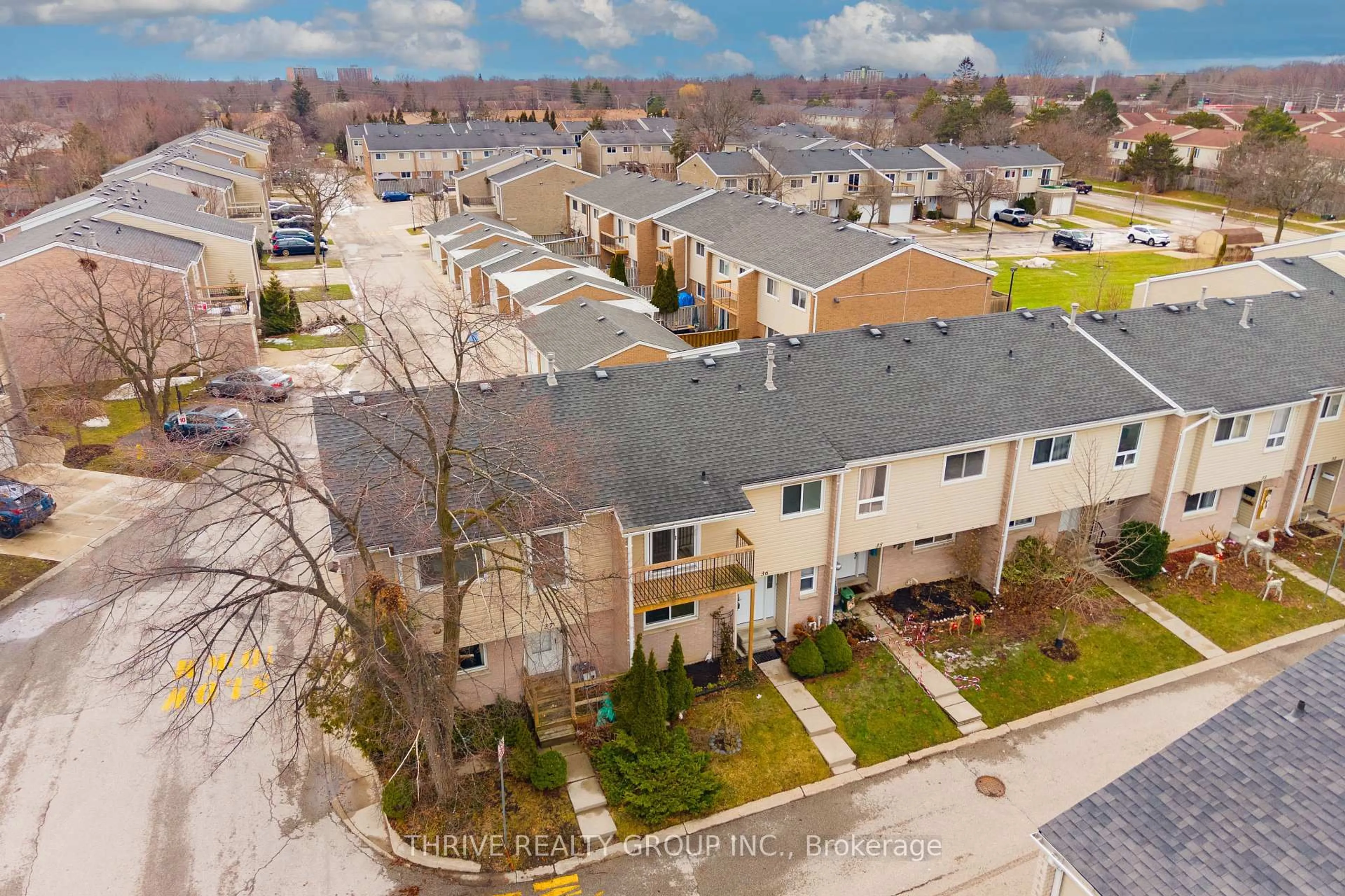 A pic from outside/outdoor area/front of a property/back of a property/a pic from drone, street for 669 Osgoode Dr #36, London South Ontario N6E 2C7