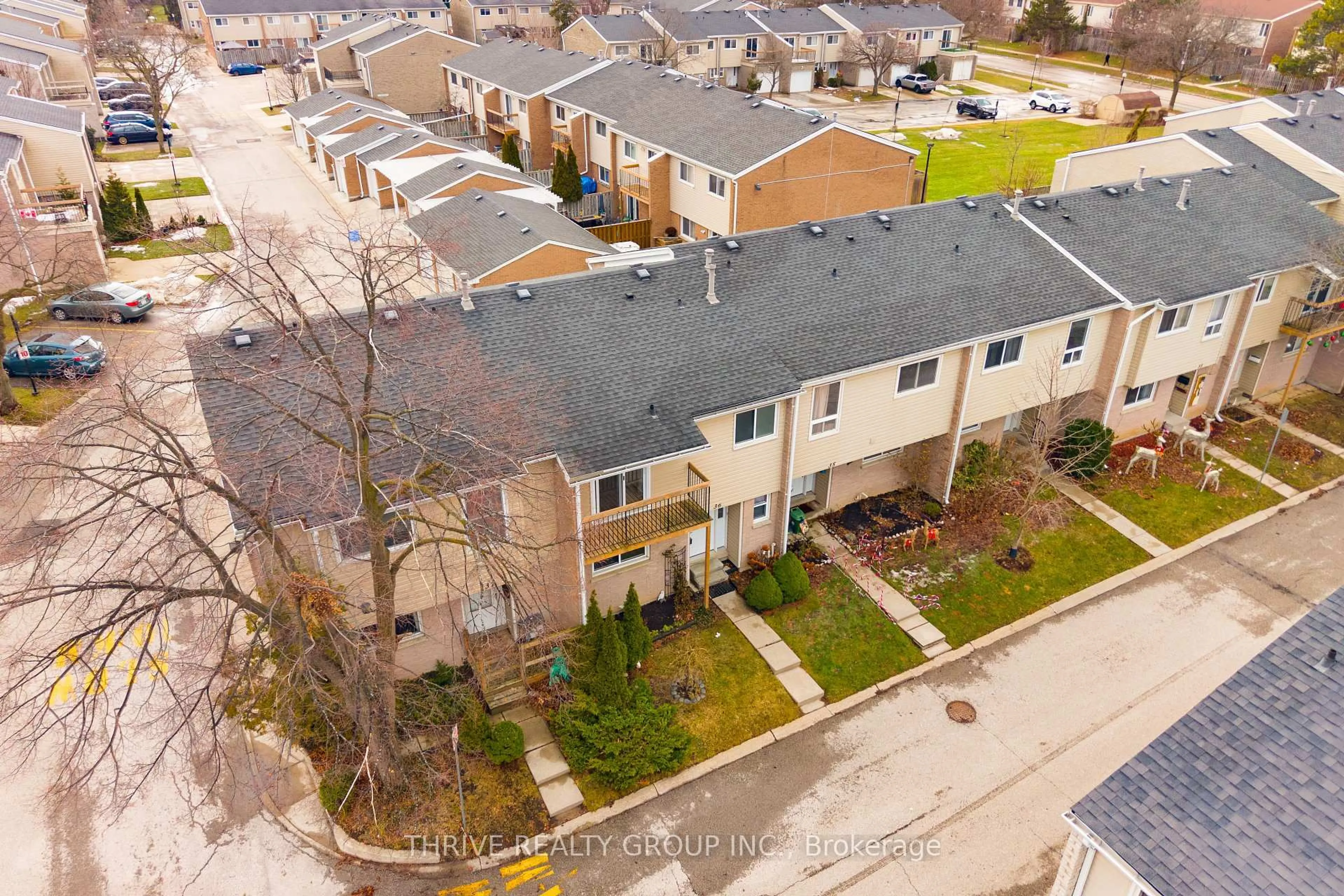 A pic from outside/outdoor area/front of a property/back of a property/a pic from drone, street for 669 Osgoode Dr #36, London South Ontario N6E 2C7