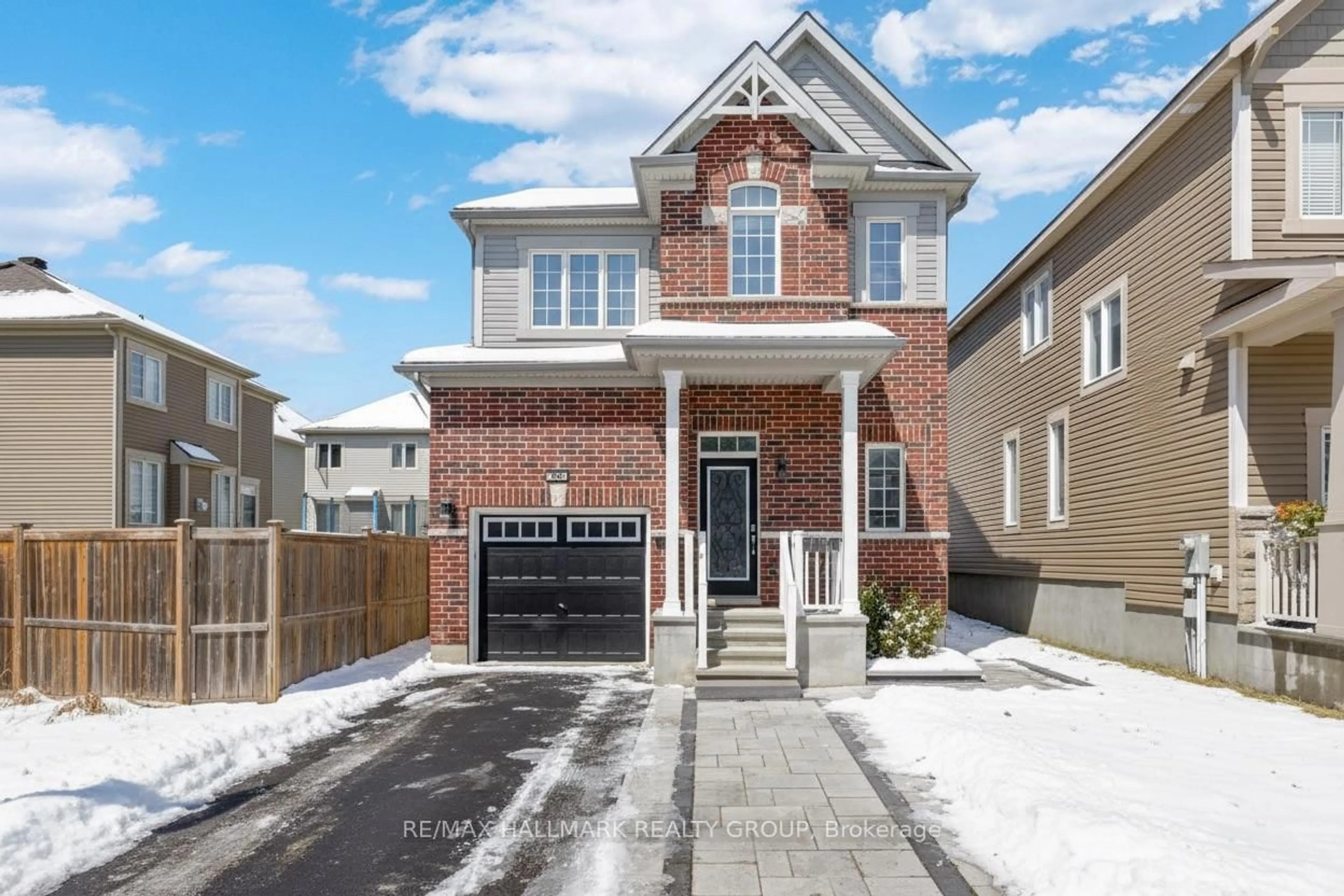 Home with brick exterior material, street for 229 Meadowbreeze Dr, Ottawa Ontario K2M 3A6