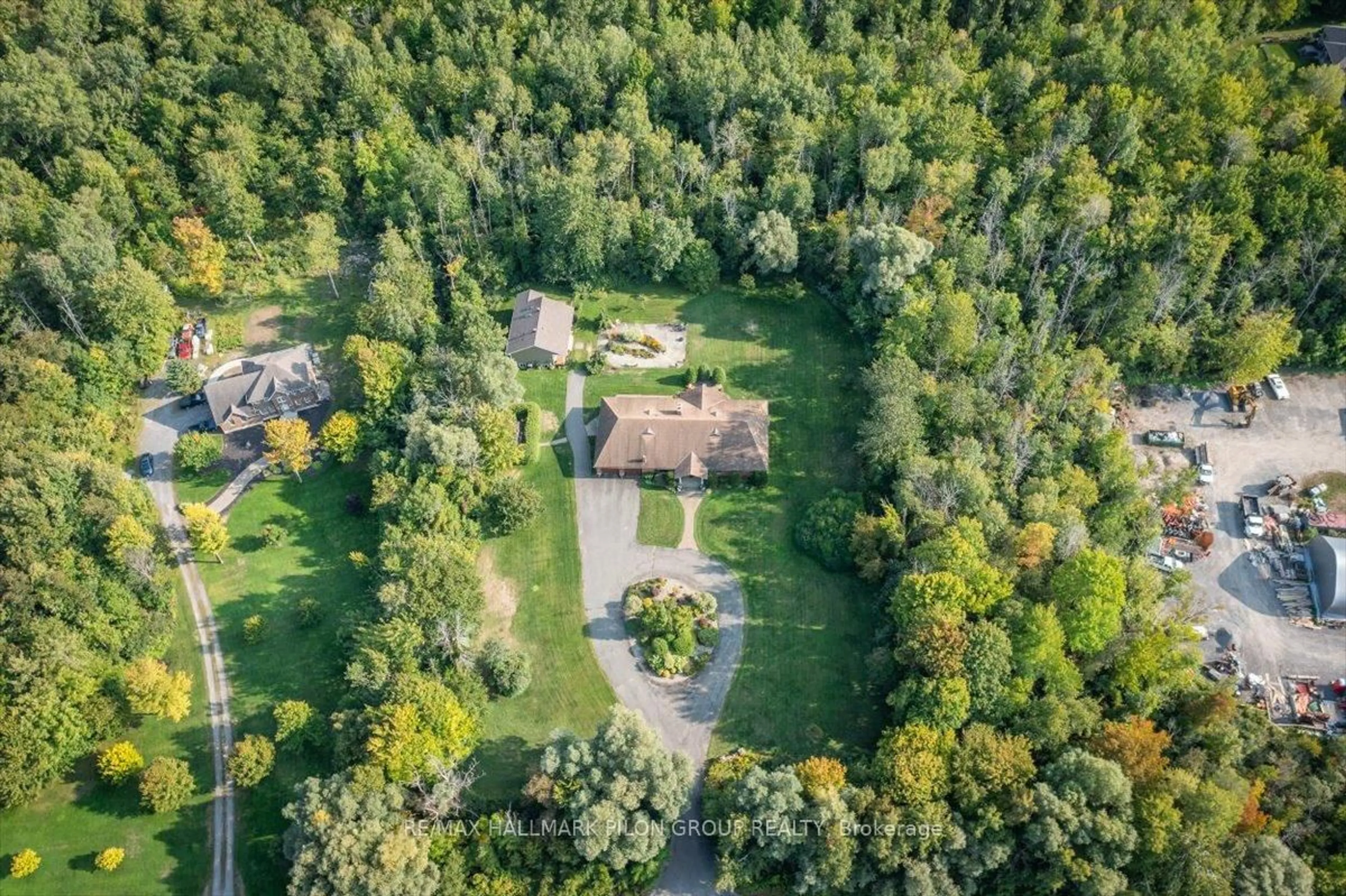 A pic from outside/outdoor area/front of a property/back of a property/a pic from drone, forest/trees view for 1717 Lakeshore Dr, Greely Ontario K4P 1H1