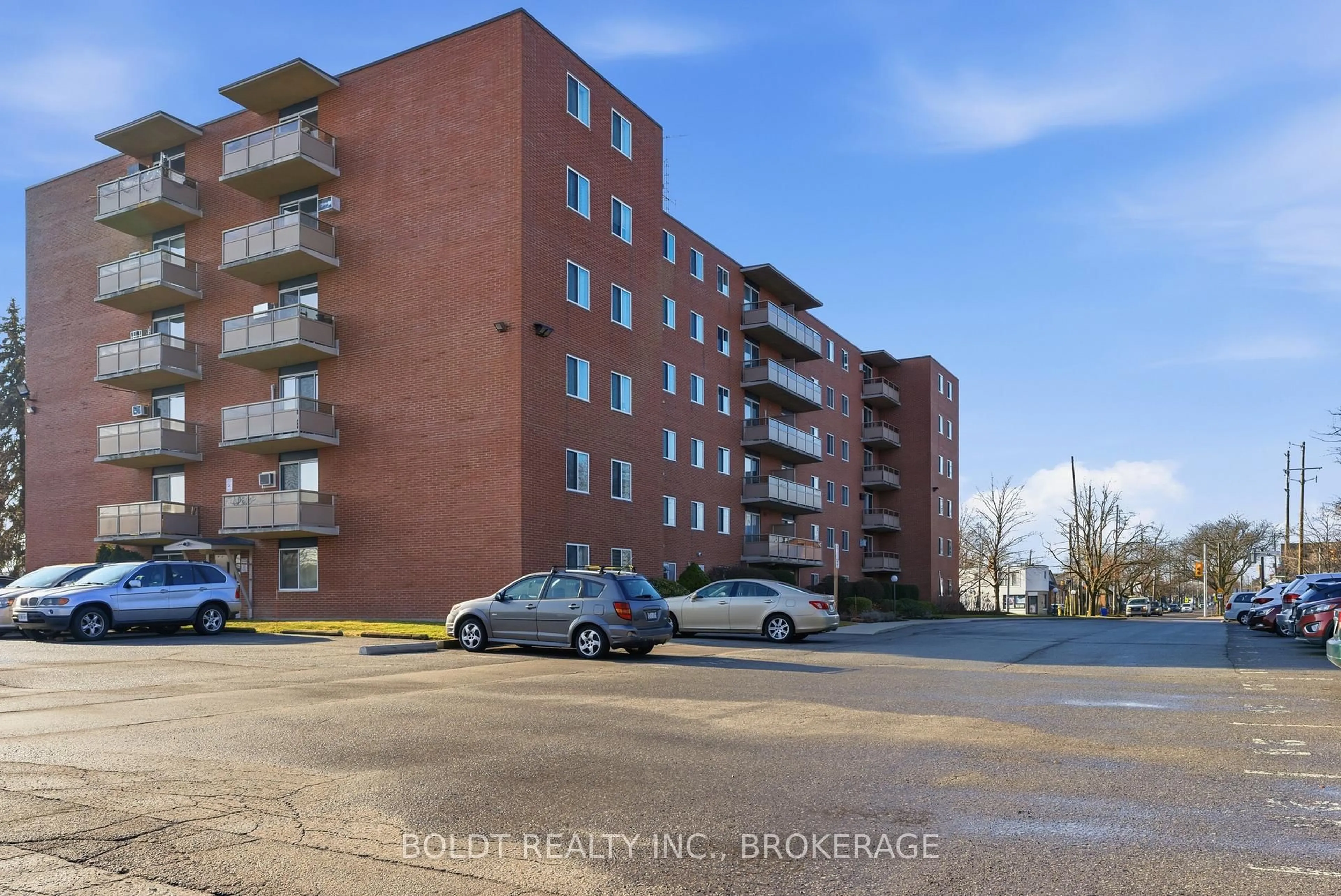 A pic from outside/outdoor area/front of a property/back of a property/a pic from drone, street for 264 Grantham Ave #107, St. Catharines Ontario L2P 3H1