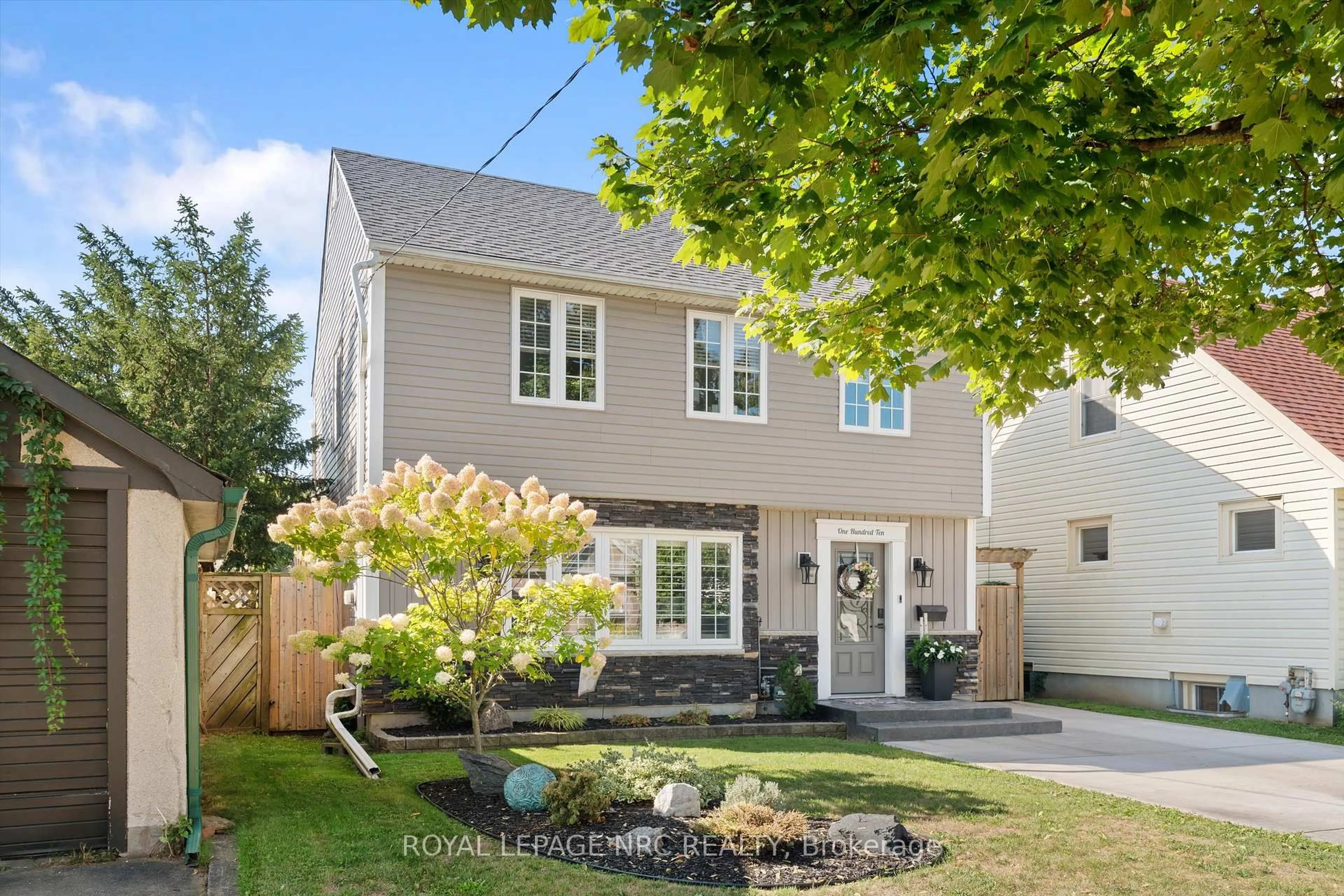 Home with vinyl exterior material, street for 110 St. Patrick St, St. Catharines Ontario L2R 1K5