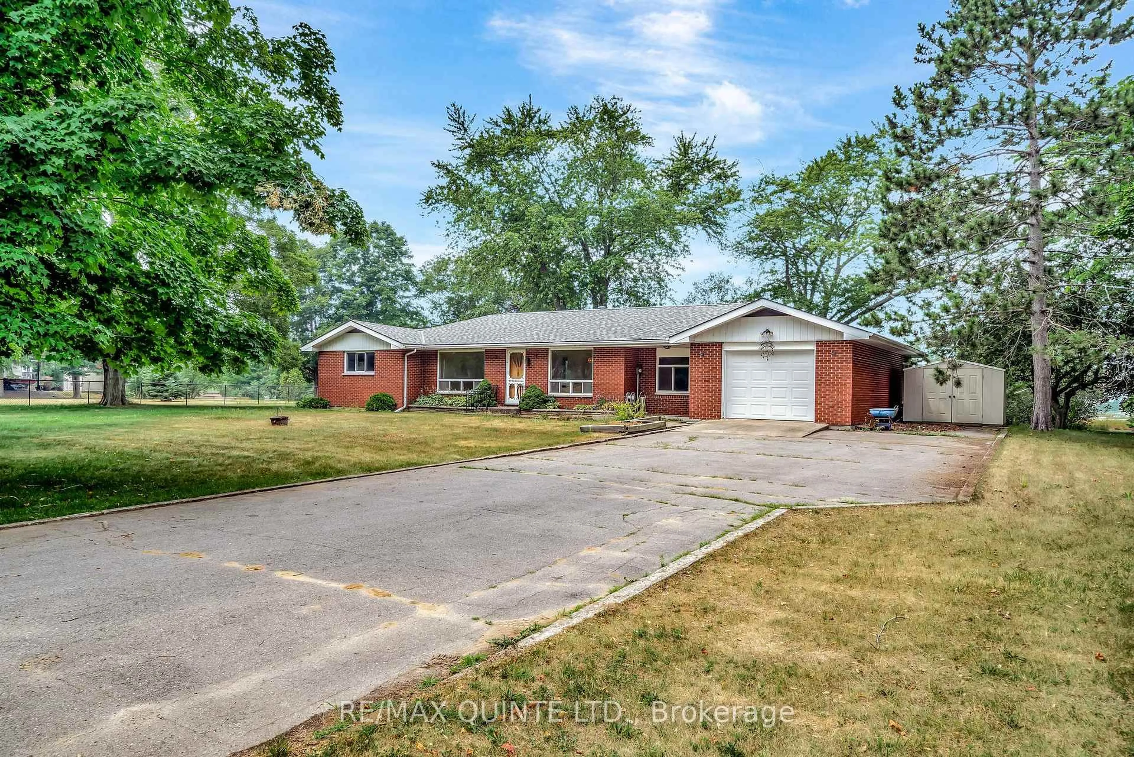 Home with brick exterior material, street for 1462 County Road 12, Prince Edward County Ontario K0K 2T0