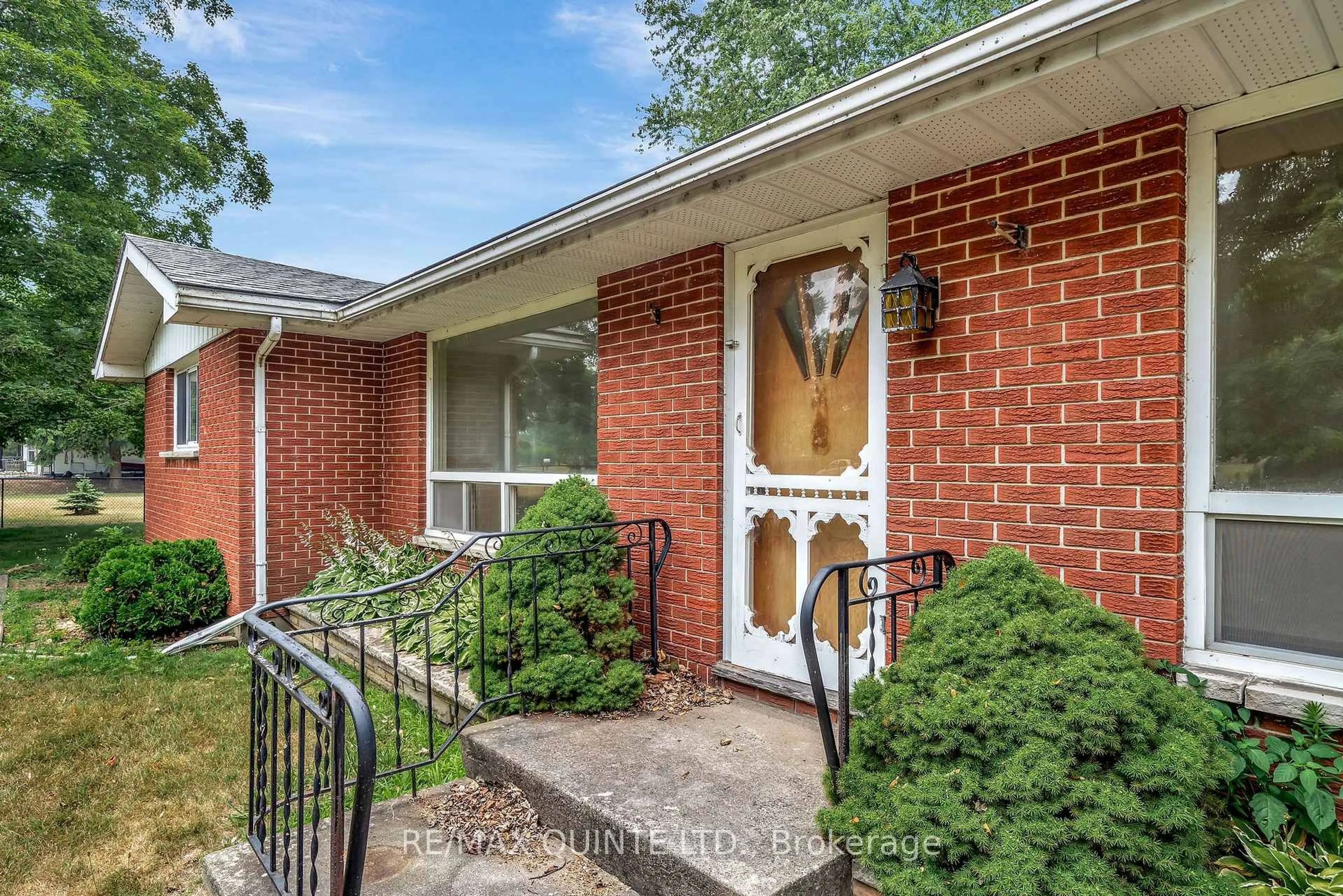 Home with brick exterior material, street for 1462 County Road 12, Prince Edward County Ontario K0K 2T0