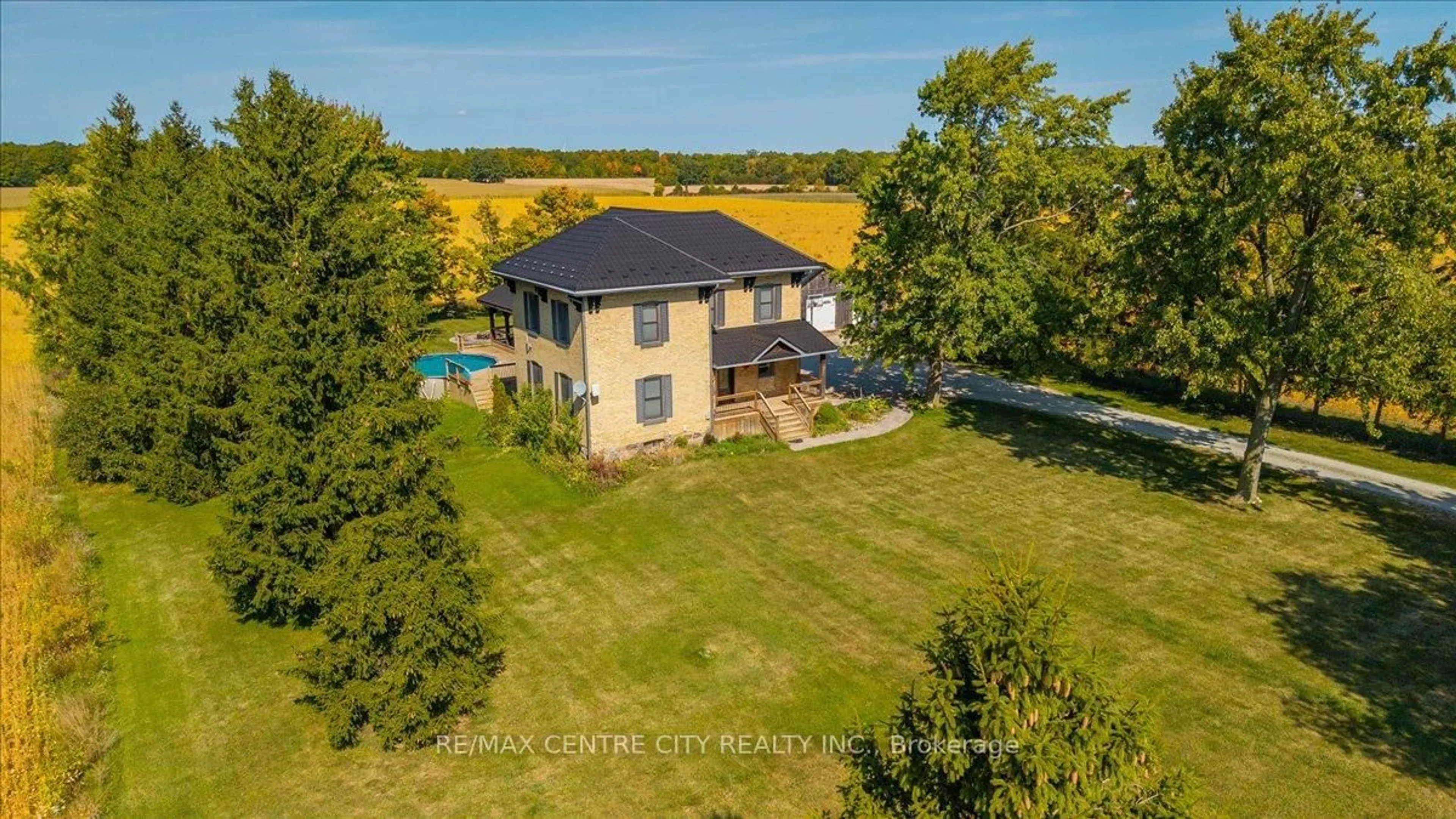 A pic from outside/outdoor area/front of a property/back of a property/a pic from drone, water/lake/river/ocean view for 9516 Argyle St, North Middlesex Ontario N0M 1A0