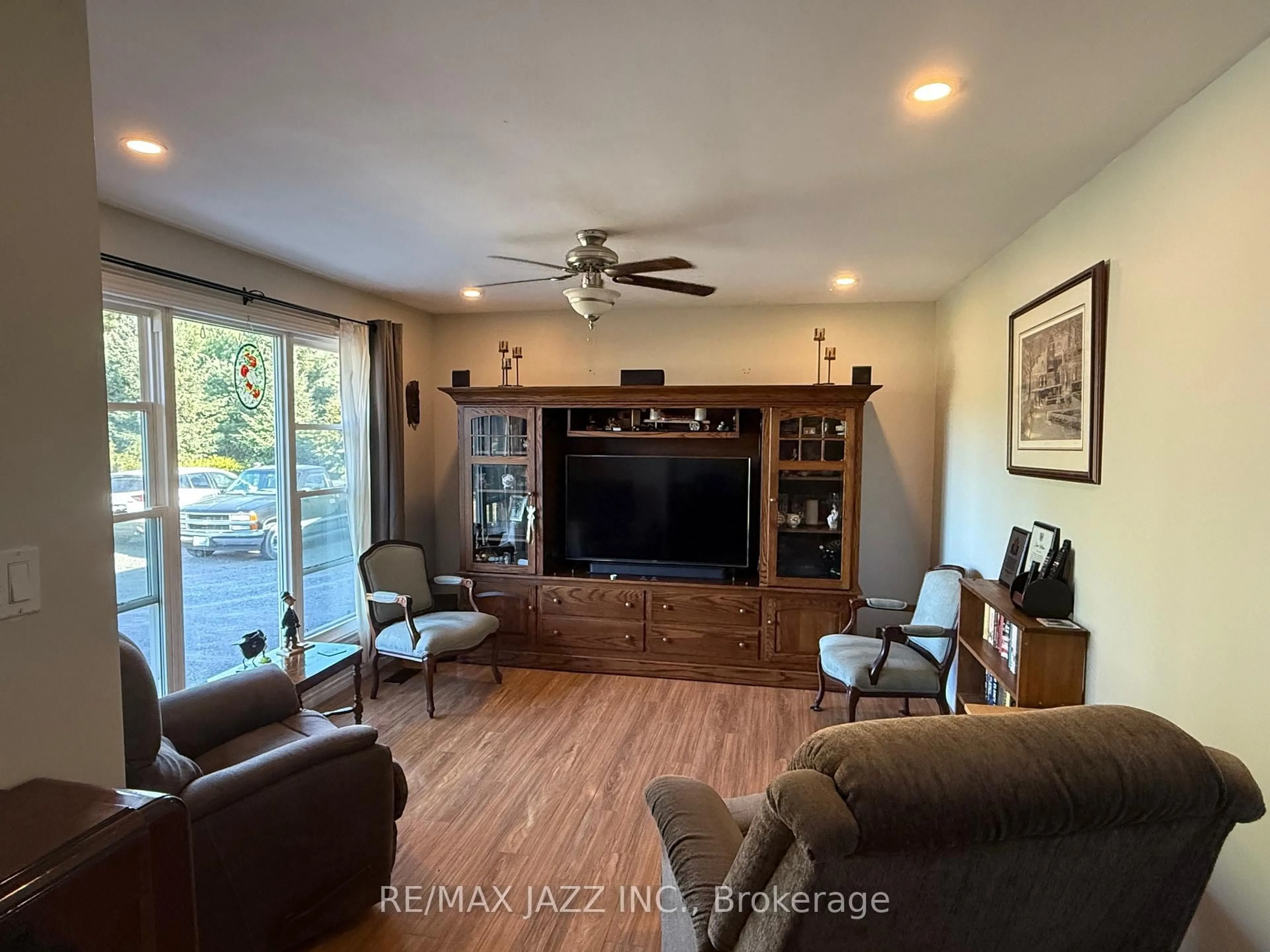 Living room with furniture, wood/laminate floor for 1967 Comstock Line, Asphodel-Norwood Ontario K0L 2V0
