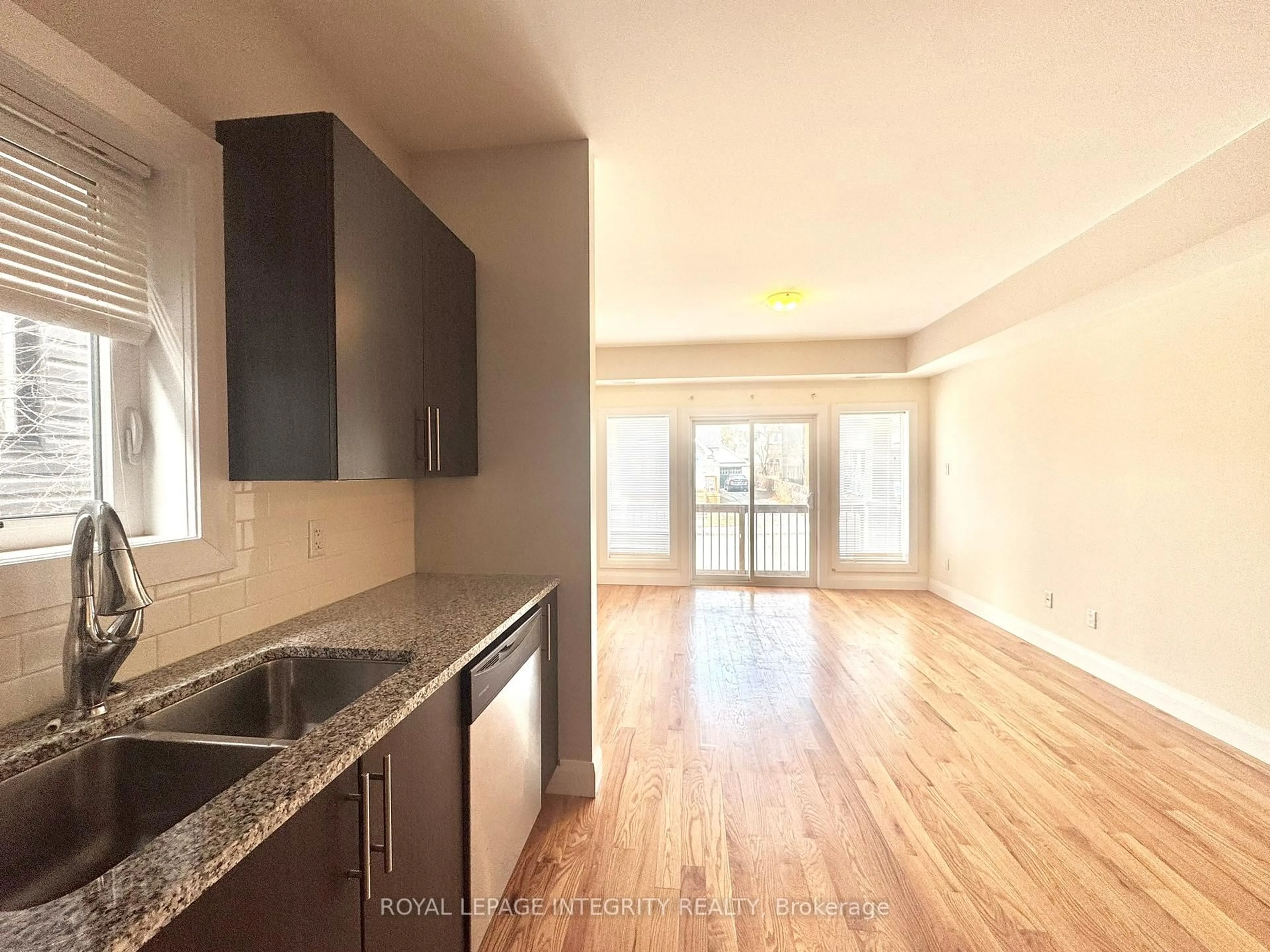 Open concept kitchen, wood/laminate floor for 138 King George St, Ottawa Ontario K1K 1V3