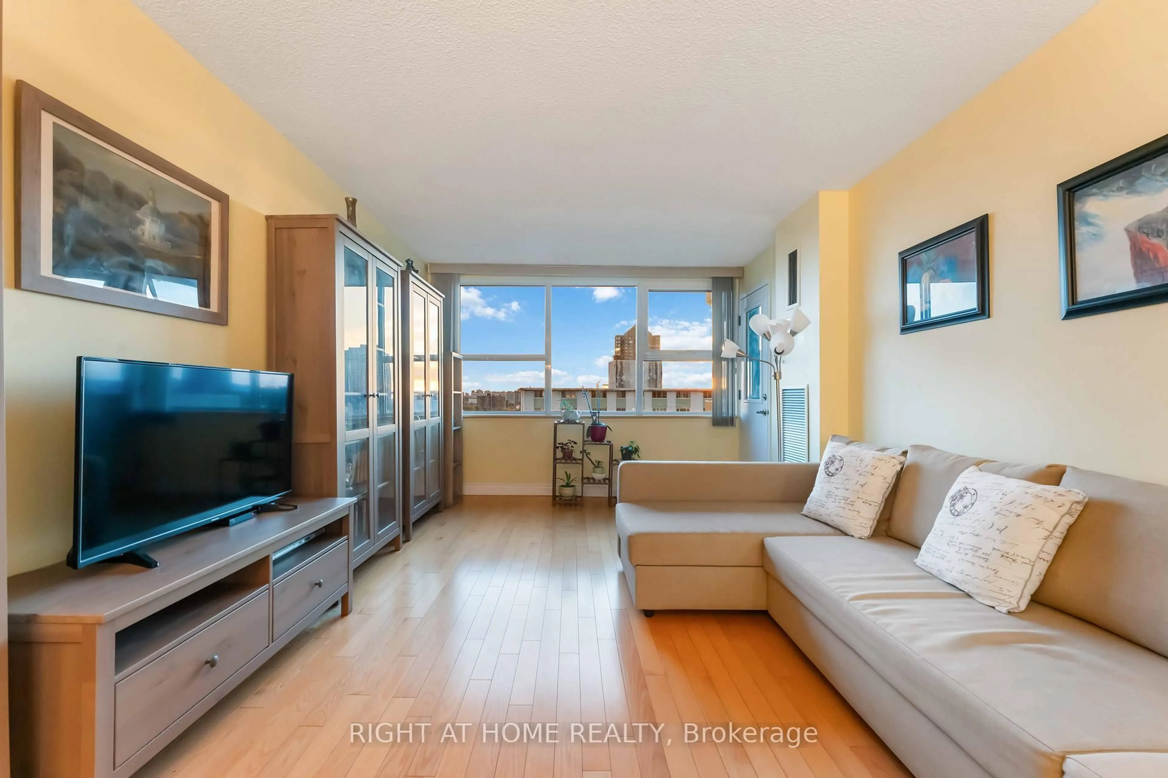 Living room with furniture, unknown for 555 Brittany Dr #903, Ottawa Ontario K1K 4C5