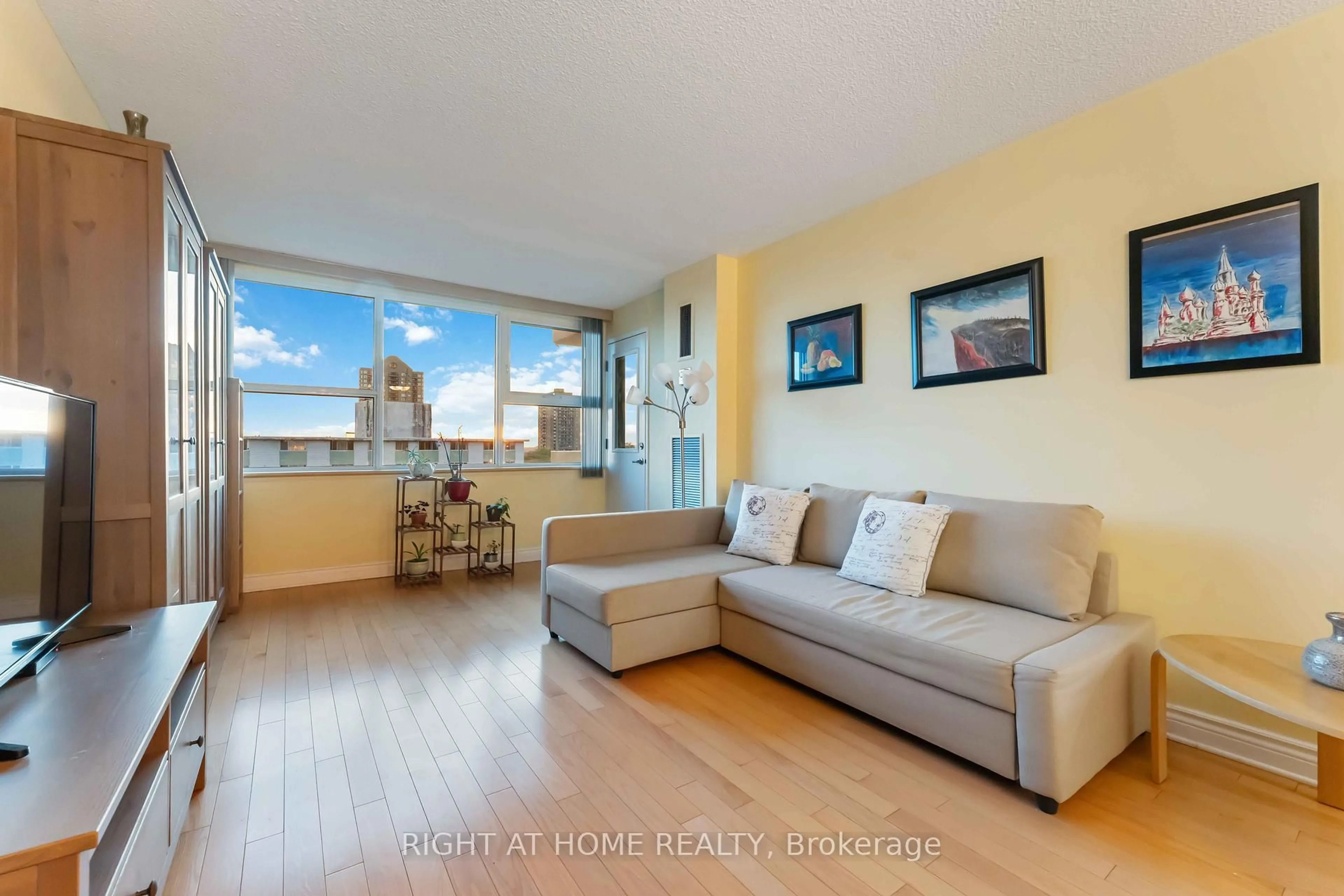 Living room with furniture, unknown for 555 Brittany Dr #903, Ottawa Ontario K1K 4C5