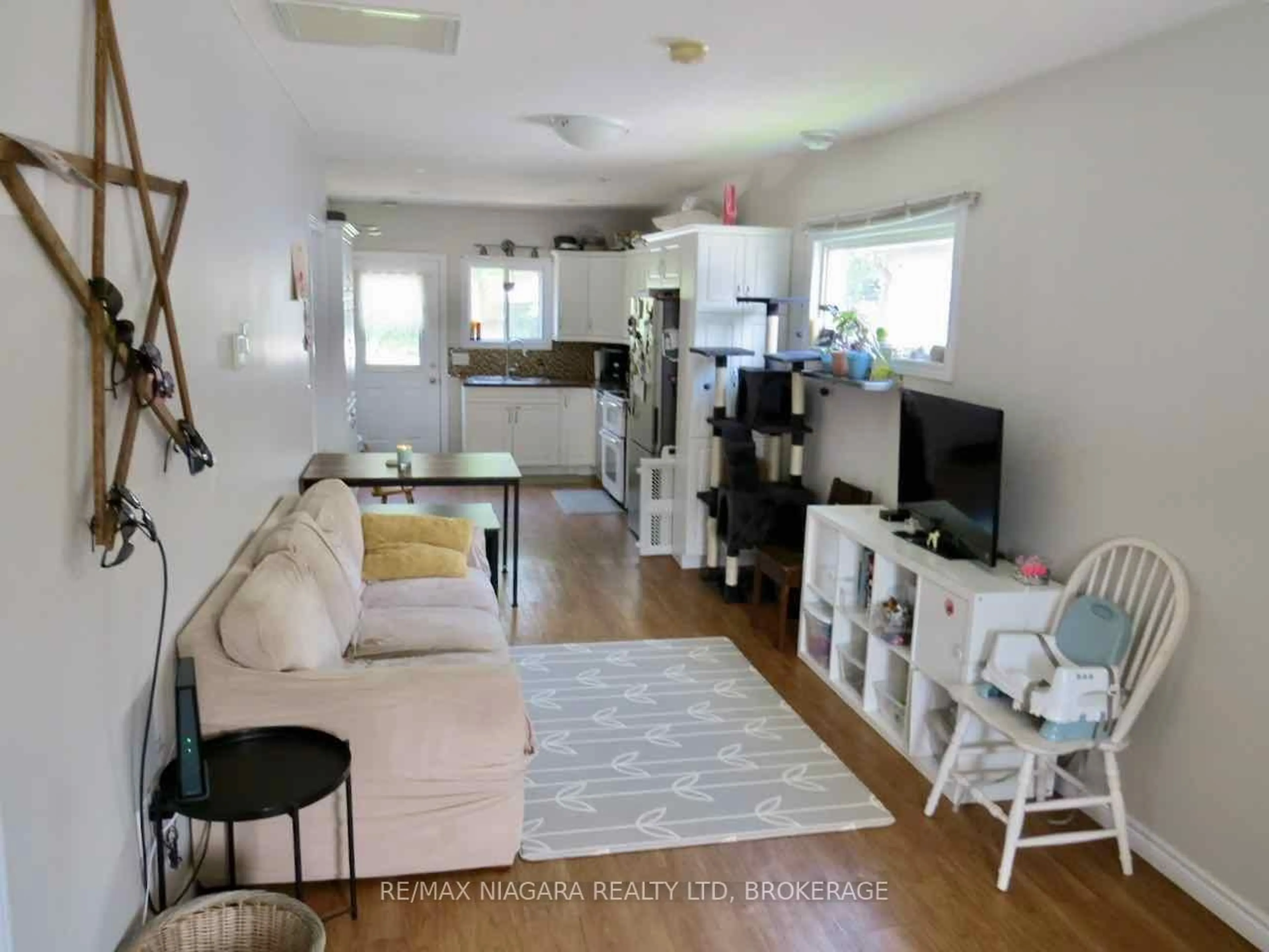 Living room with furniture, unknown for 52 Mccormick St, Welland Ontario L3C 4L9