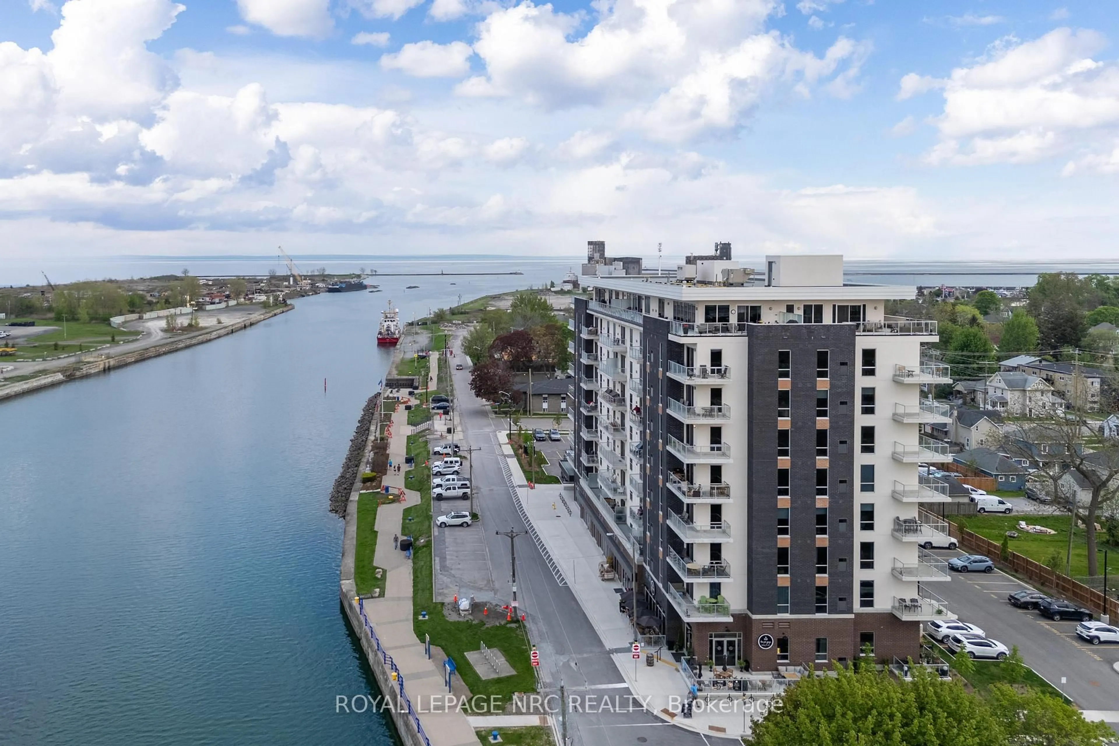 A pic from outside/outdoor area/front of a property/back of a property/a pic from drone, water/lake/river/ocean view for 118 West St #602, Port Colborne Ontario L3K 0B9