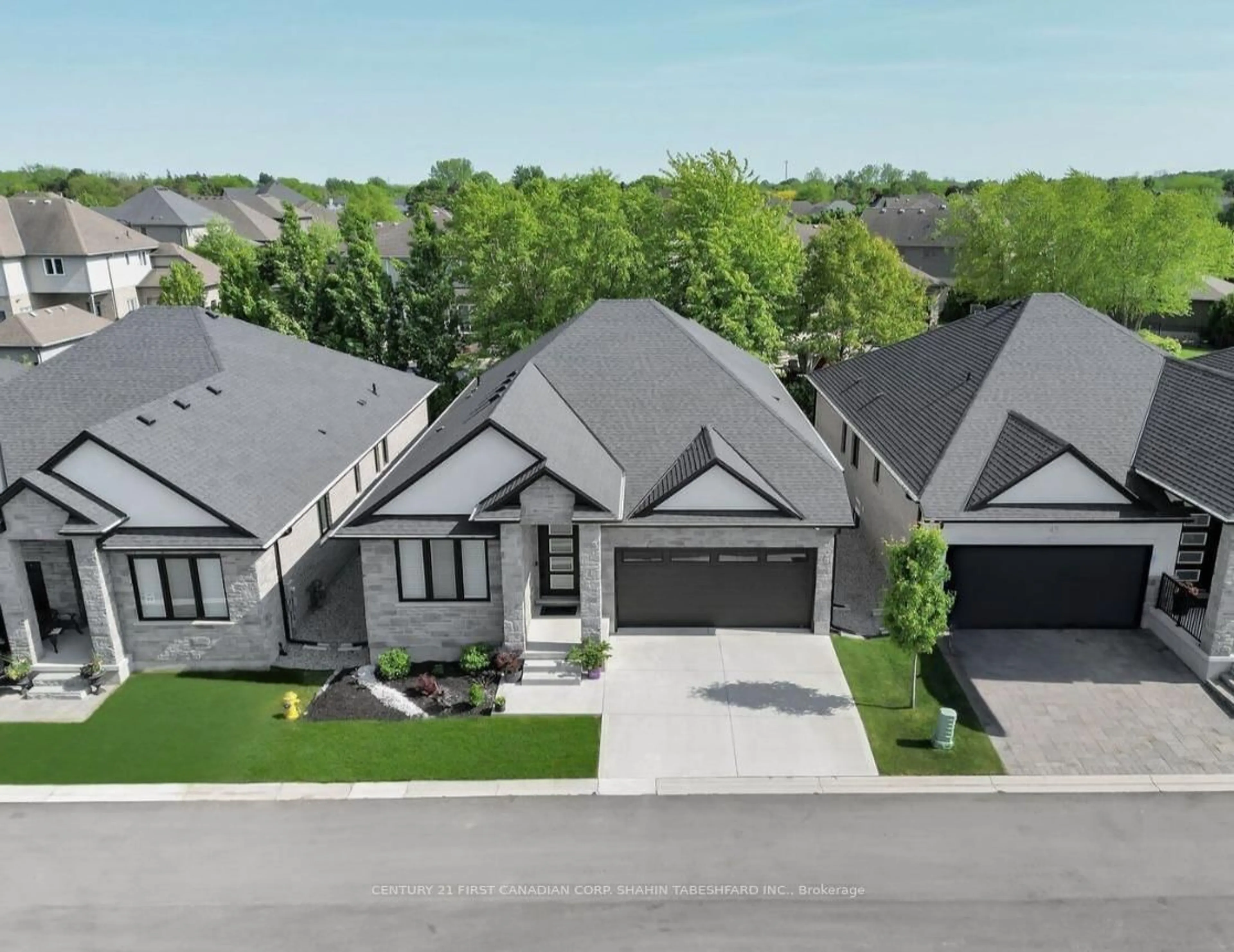 A pic from outside/outdoor area/front of a property/back of a property/a pic from drone, street for 6990 Clayton Walk #45, London South Ontario N6P 0B2