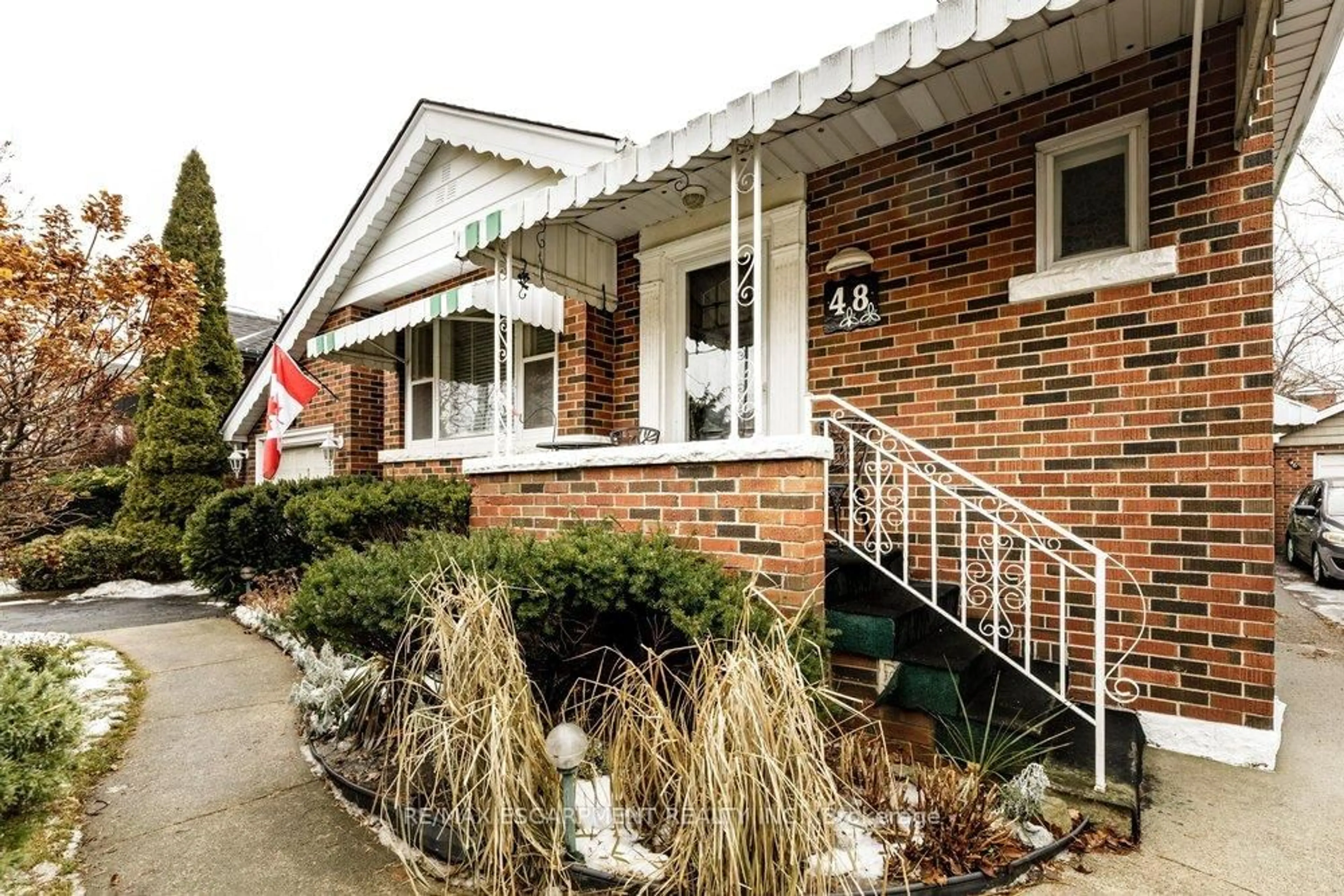 Home with brick exterior material, street for 48 Crosthwaite Ave, Hamilton Ontario L8K 2V1