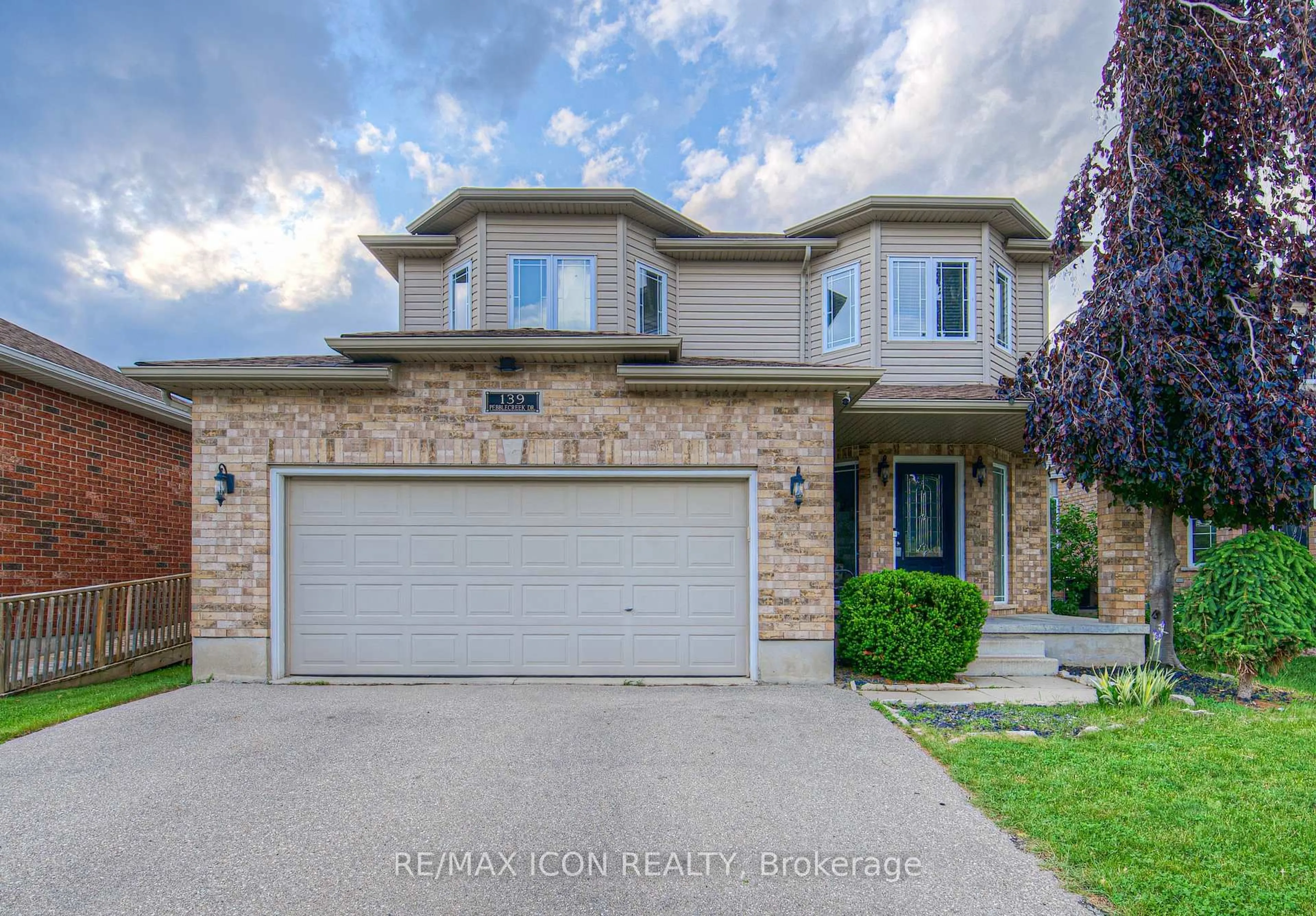 Home with brick exterior material, street for 139 Pebblecreek Dr, Kitchener Ontario N2A 4M4