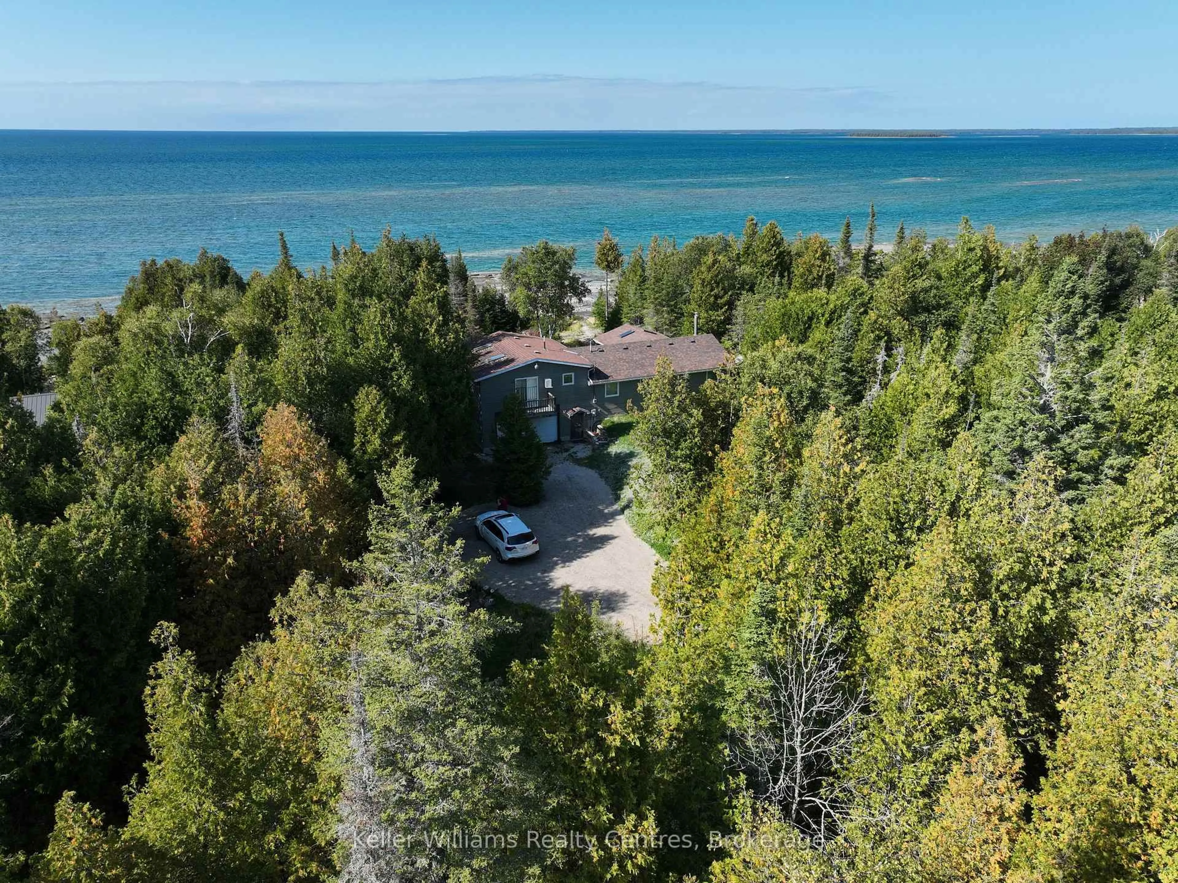 A pic from outside/outdoor area/front of a property/back of a property/a pic from drone, water/lake/river/ocean view for 62 Zorra Dr, Northern Bruce Peninsula Ontario N0H 2R0