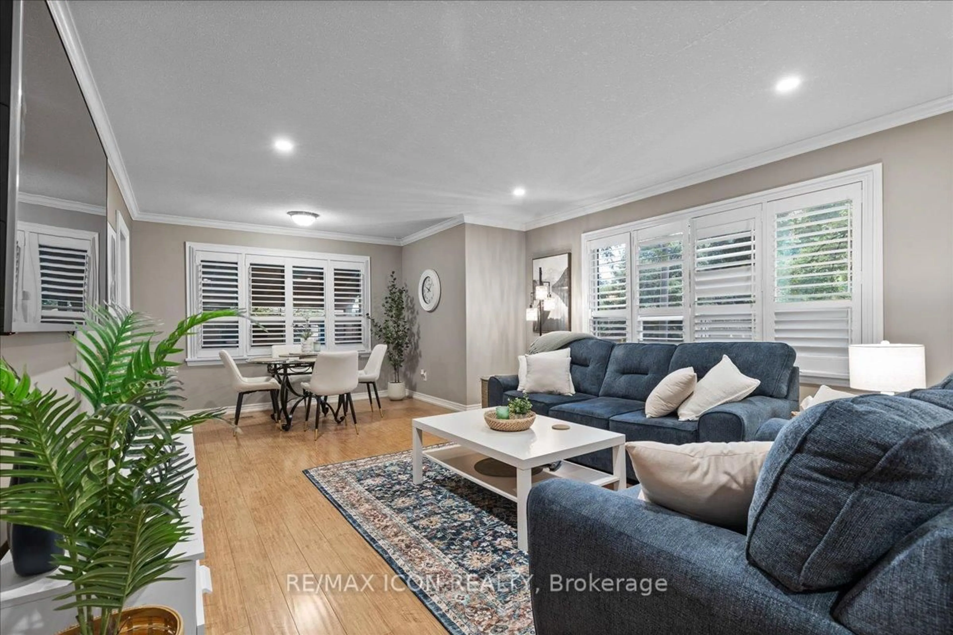 Living room with furniture, wood/laminate floor for 50 Grove Cres, Brantford Ontario N3R 4Y6