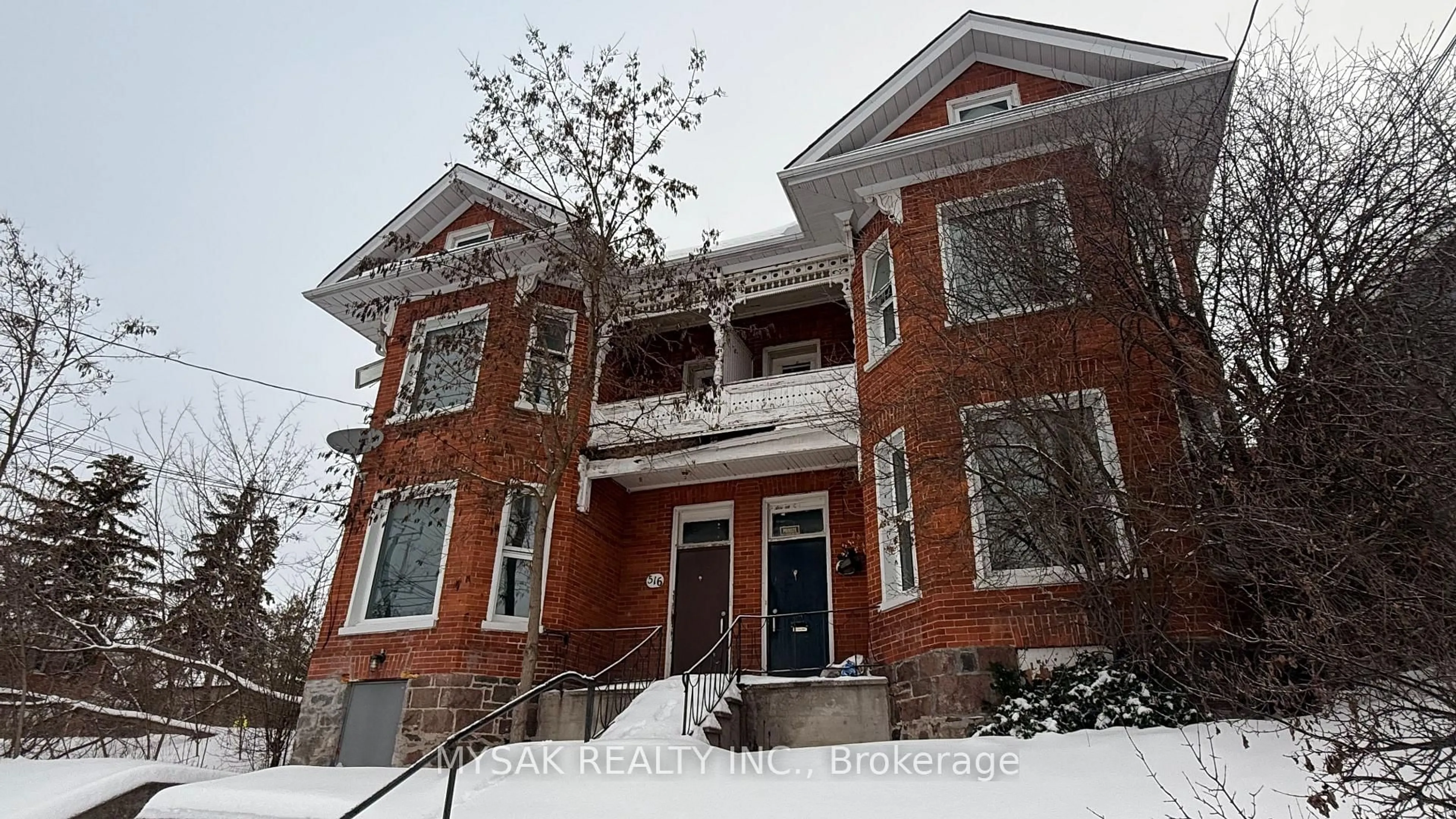Home with brick exterior material, building for 514-516 Aylmer St, Peterborough Ontario K9H 3W5
