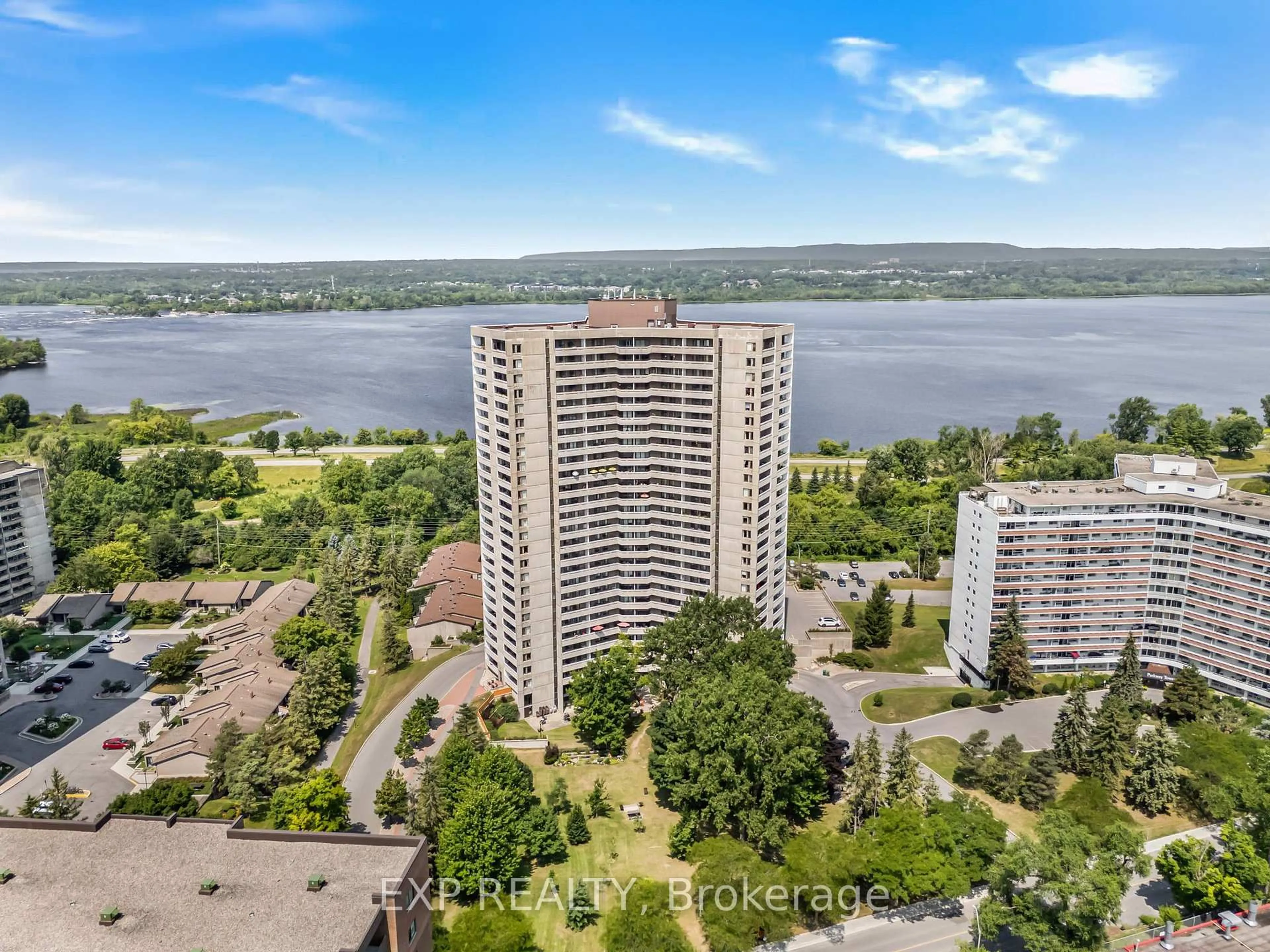A pic from outside/outdoor area/front of a property/back of a property/a pic from drone, water/lake/river/ocean view for 1081 AMBLESIDE Dr #1501, Ottawa Ontario K2B 8C8