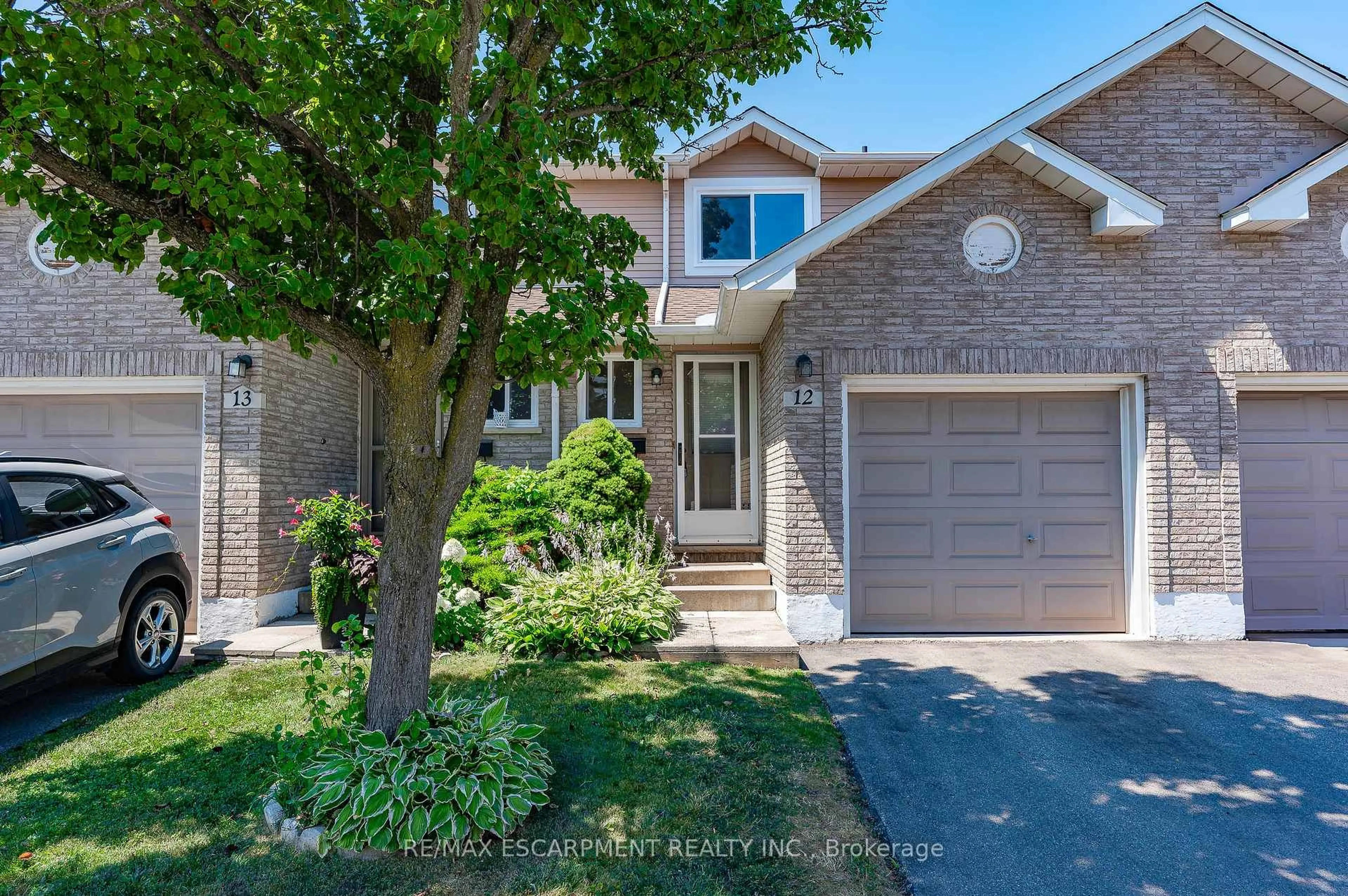 Home with brick exterior material, street for 610 Barton St #12, Hamilton Ontario L8E 5V2