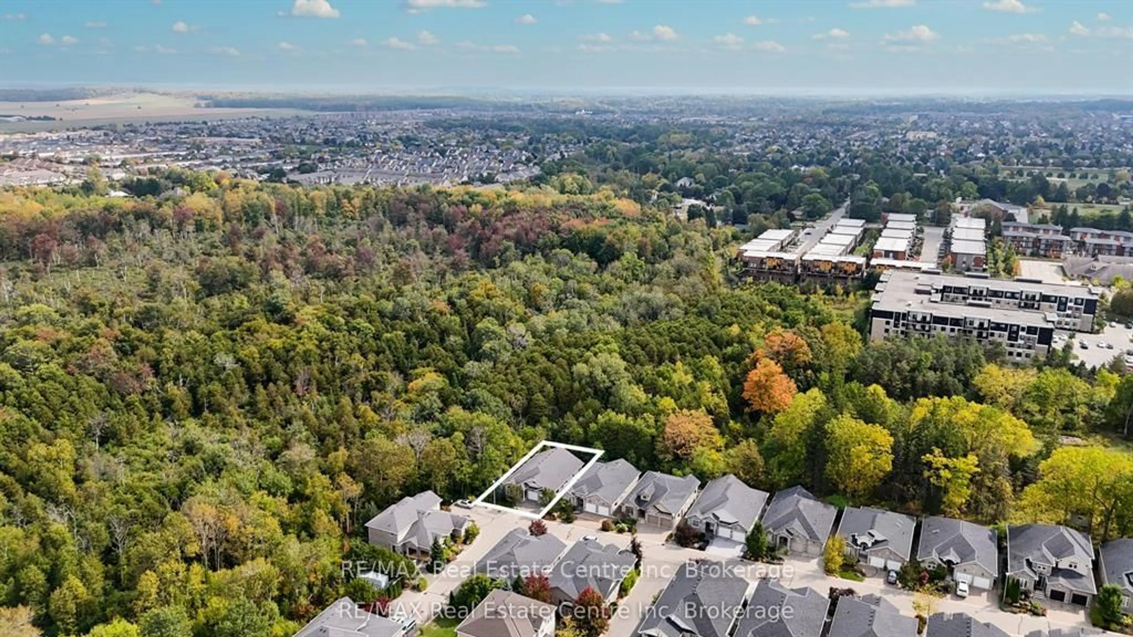 A pic from outside/outdoor area/front of a property/back of a property/a pic from drone, forest/trees view for 15 Valley Rd #19, Guelph Ontario N1L 0H3