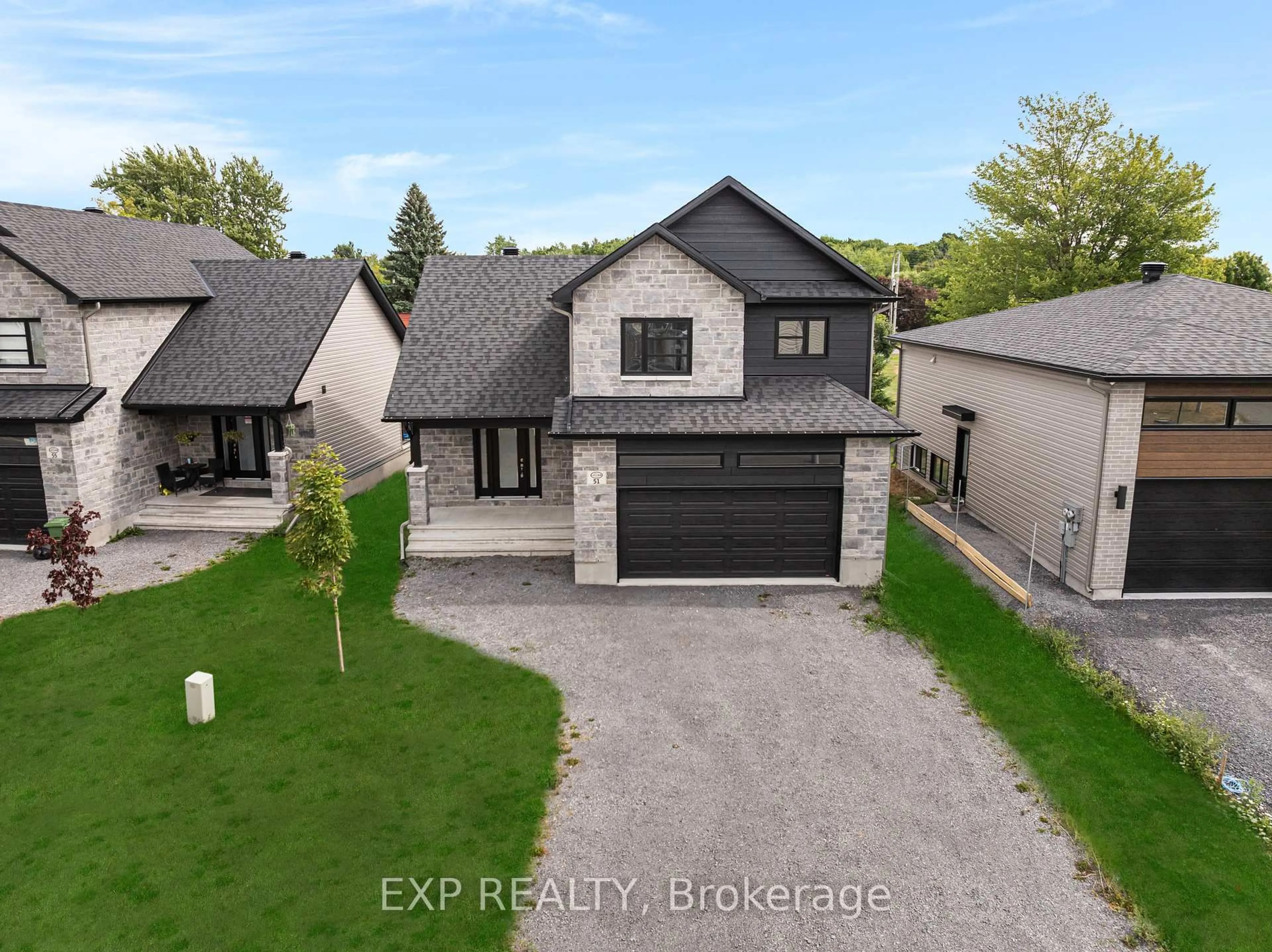 A pic from outside/outdoor area/front of a property/back of a property/a pic from drone, street for 75 Chateauguay St, Russell Ontario K0A 2M0