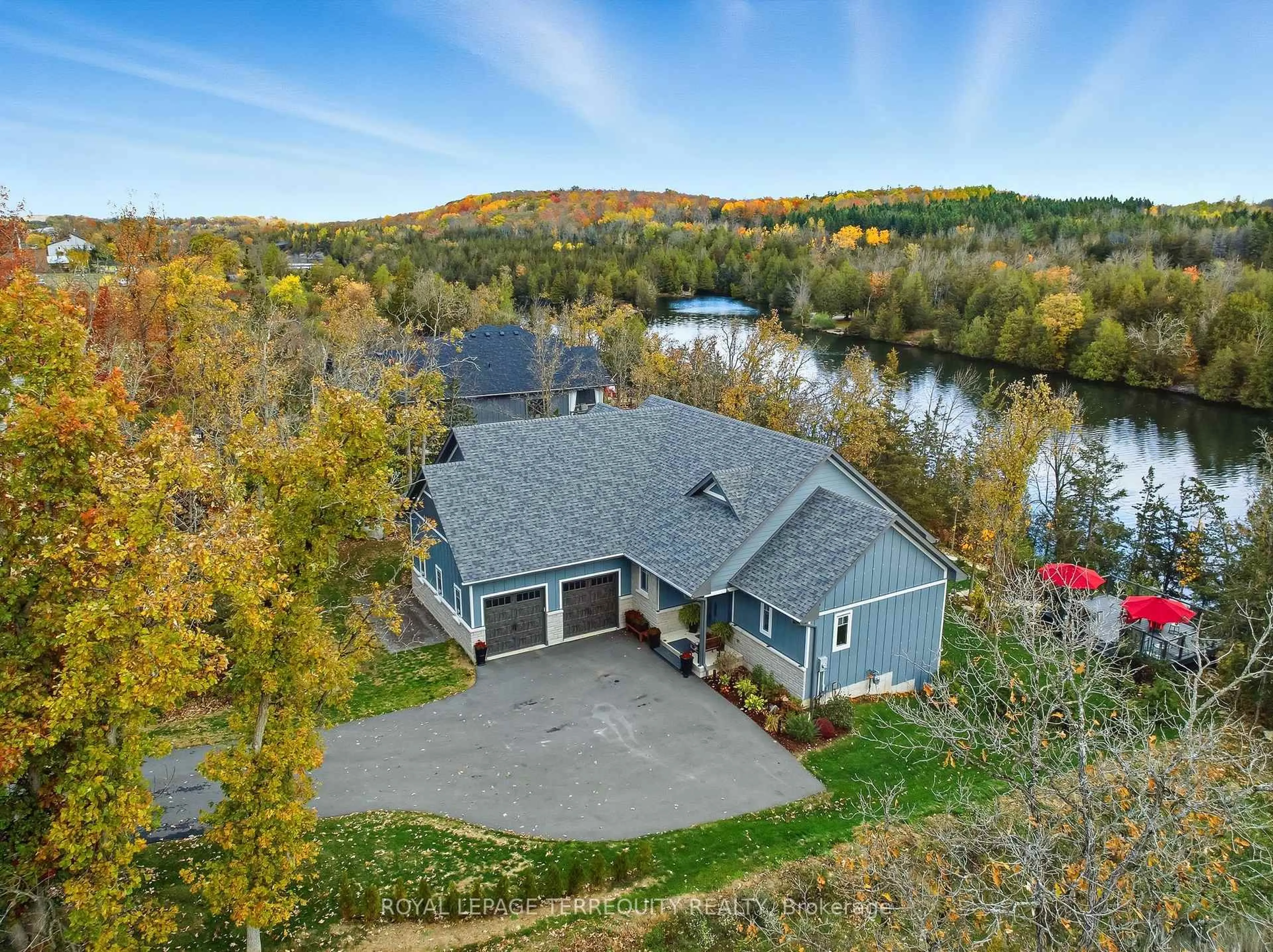 A pic from outside/outdoor area/front of a property/back of a property/a pic from drone, water/lake/river/ocean view for 5 Riverside Tr, Trent Hills Ontario K0L 1L0