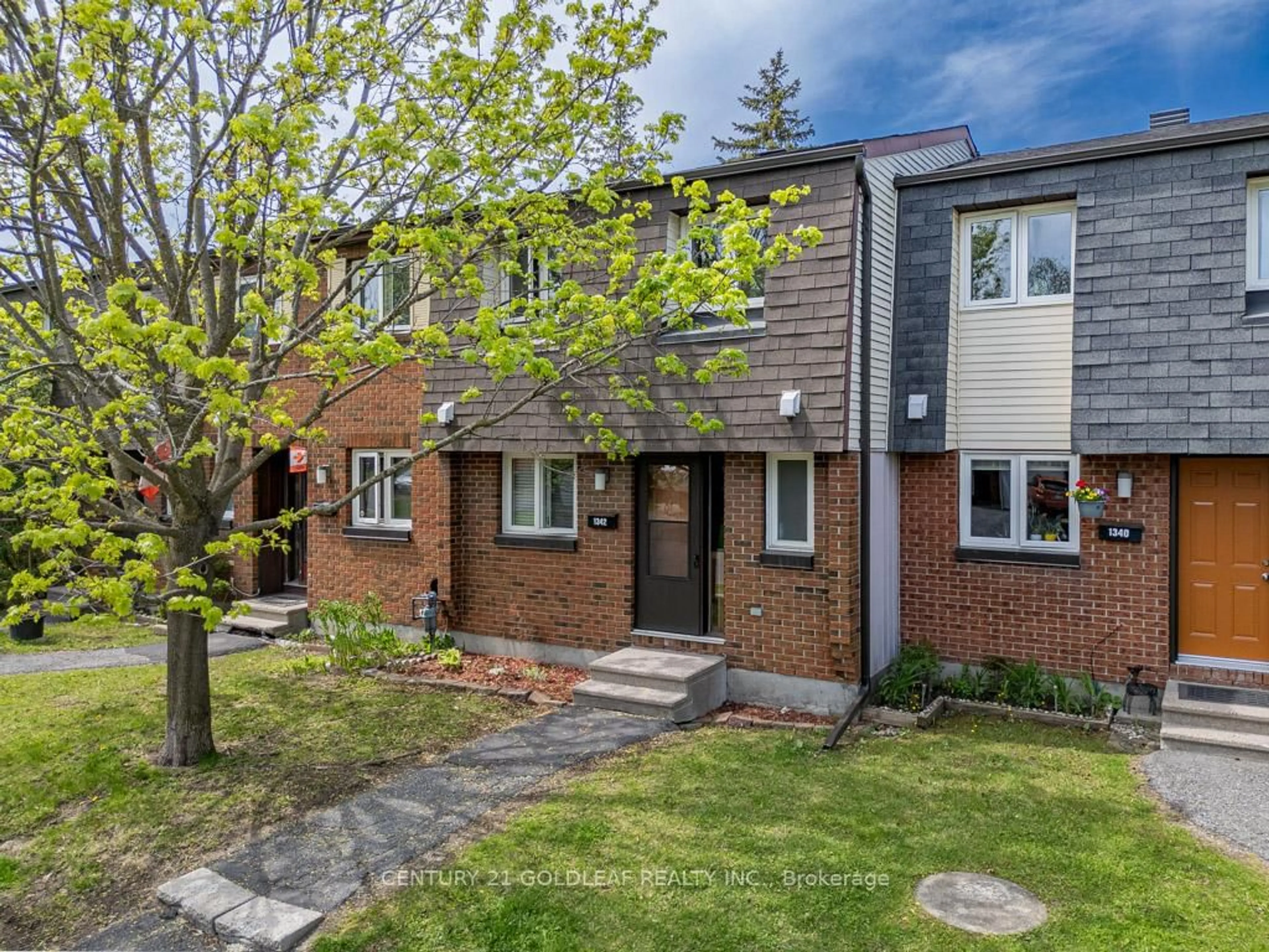 Home with brick exterior material, street for 1342 Cedarcroft Cres #11, Ottawa Ontario K1B 5C8