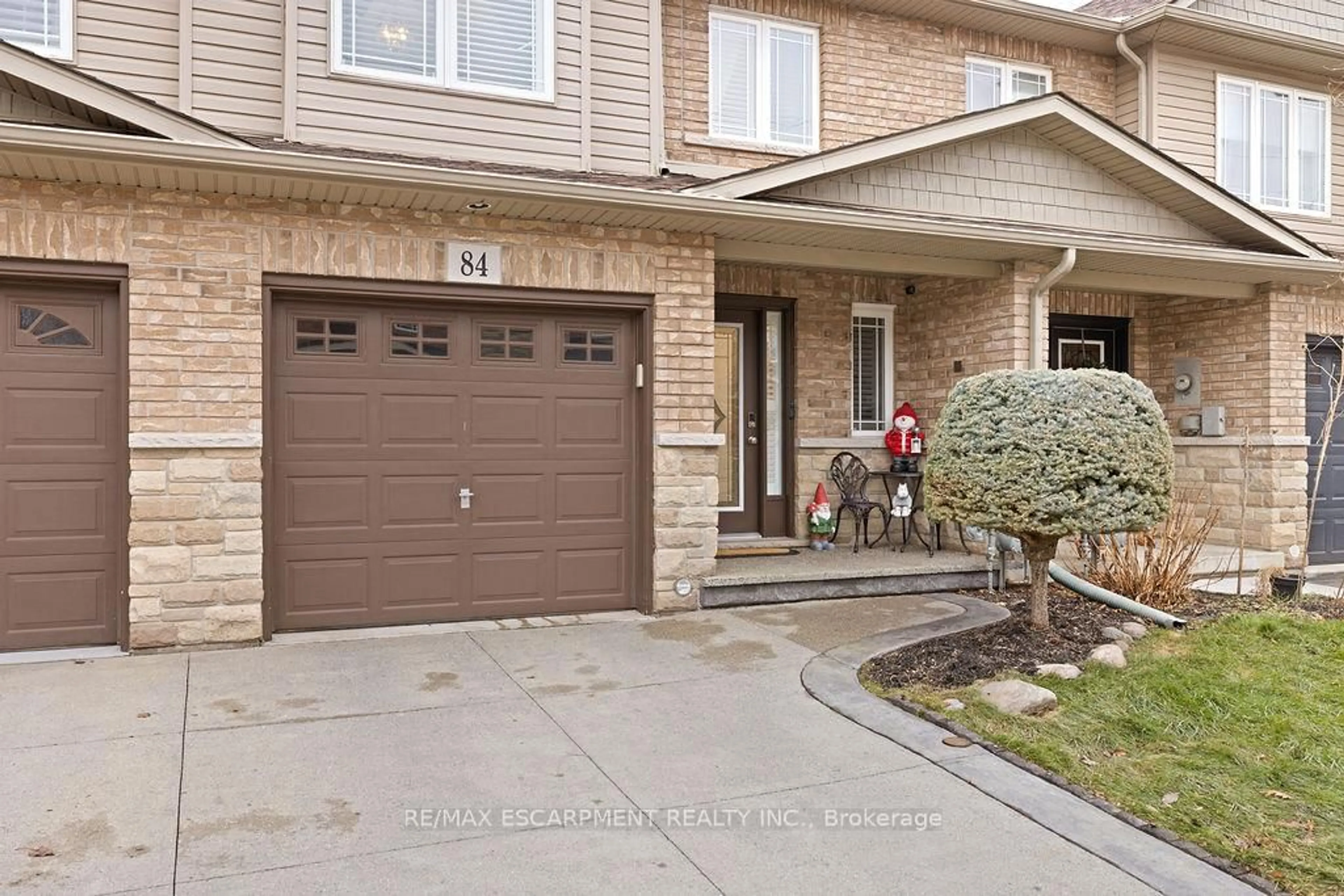 Home with brick exterior material, street for 84 Periwinkle Dr, Hamilton Ontario L0R 1P0