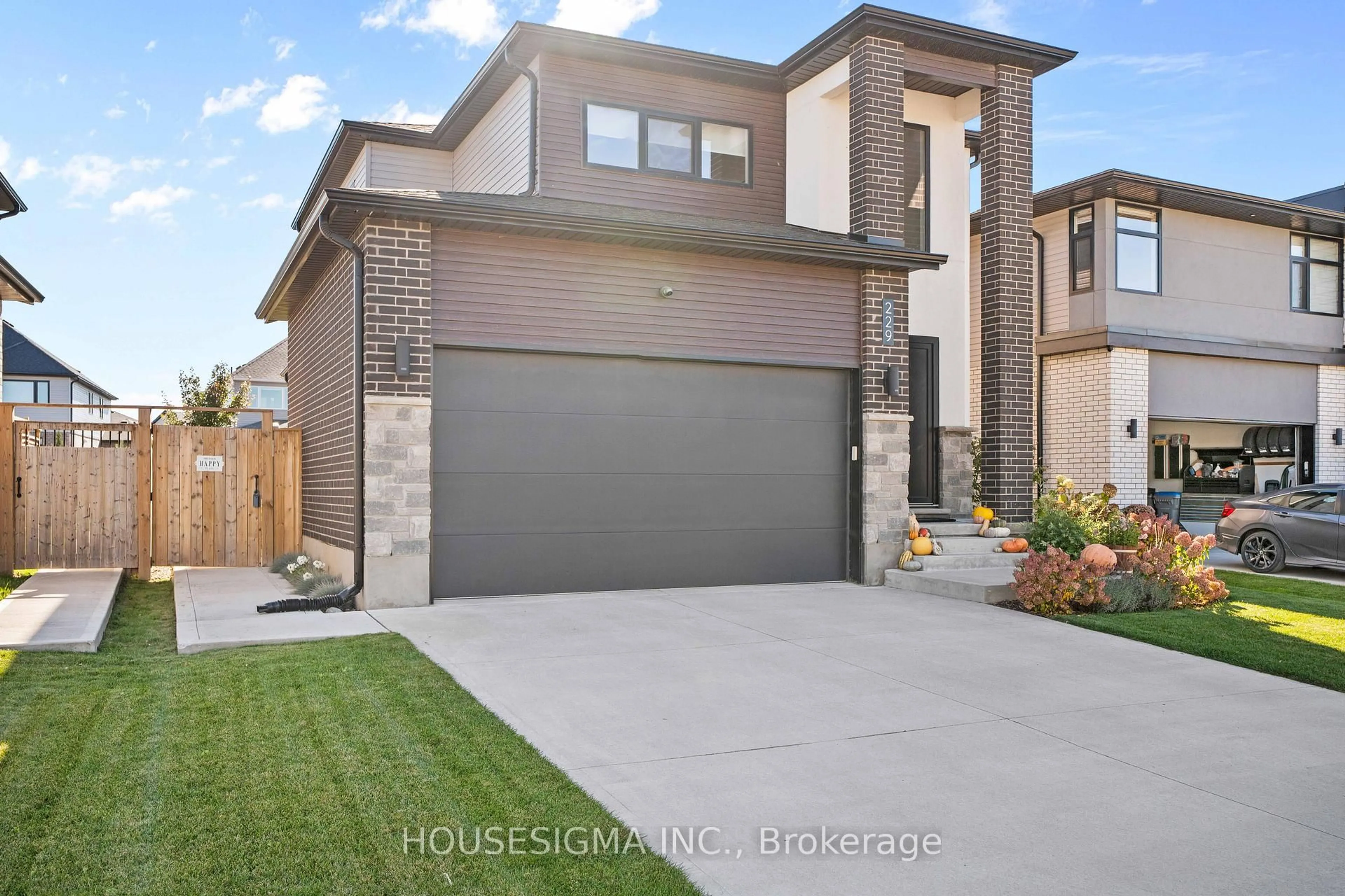 Home with brick exterior material, street for 229 Crestview Dr, Middlesex Centre Ontario N0L 1R0