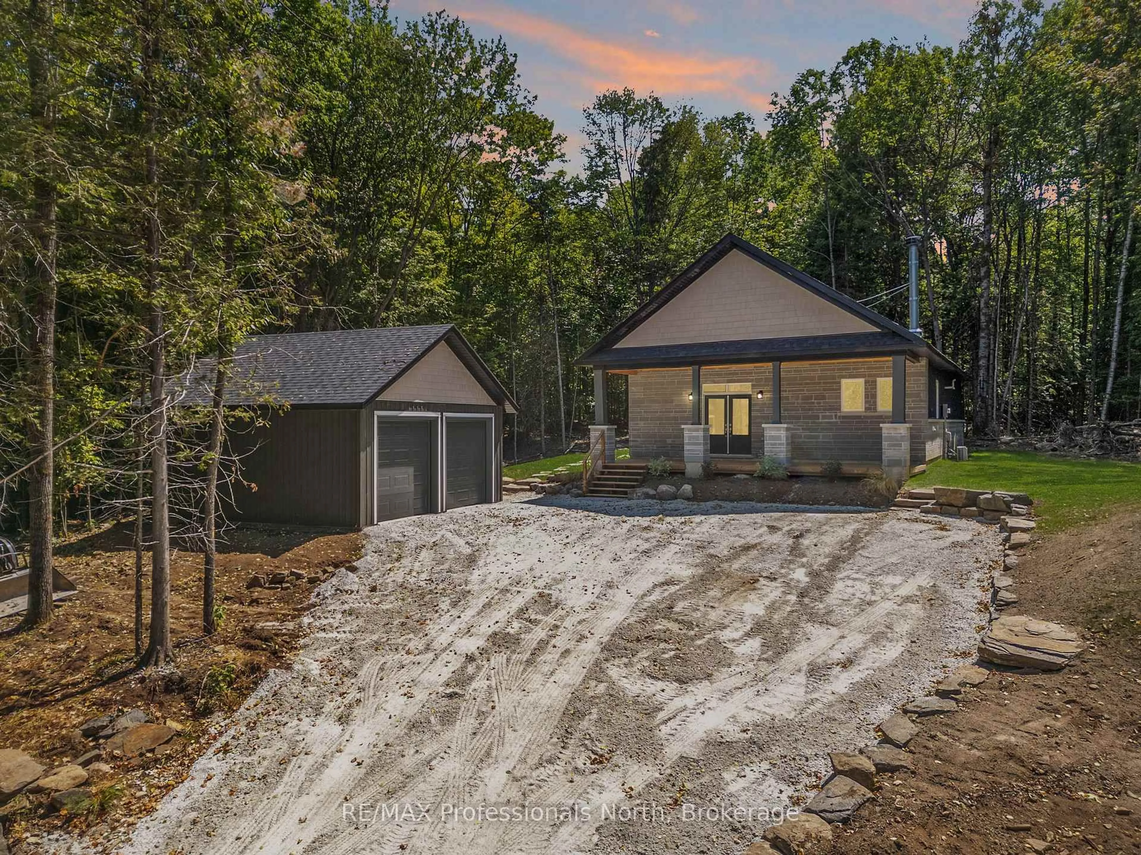 A pic from outside/outdoor area/front of a property/back of a property/a pic from drone, forest/trees view for 1076 Angel Rd, Dysart et al Ontario K0M 1M0