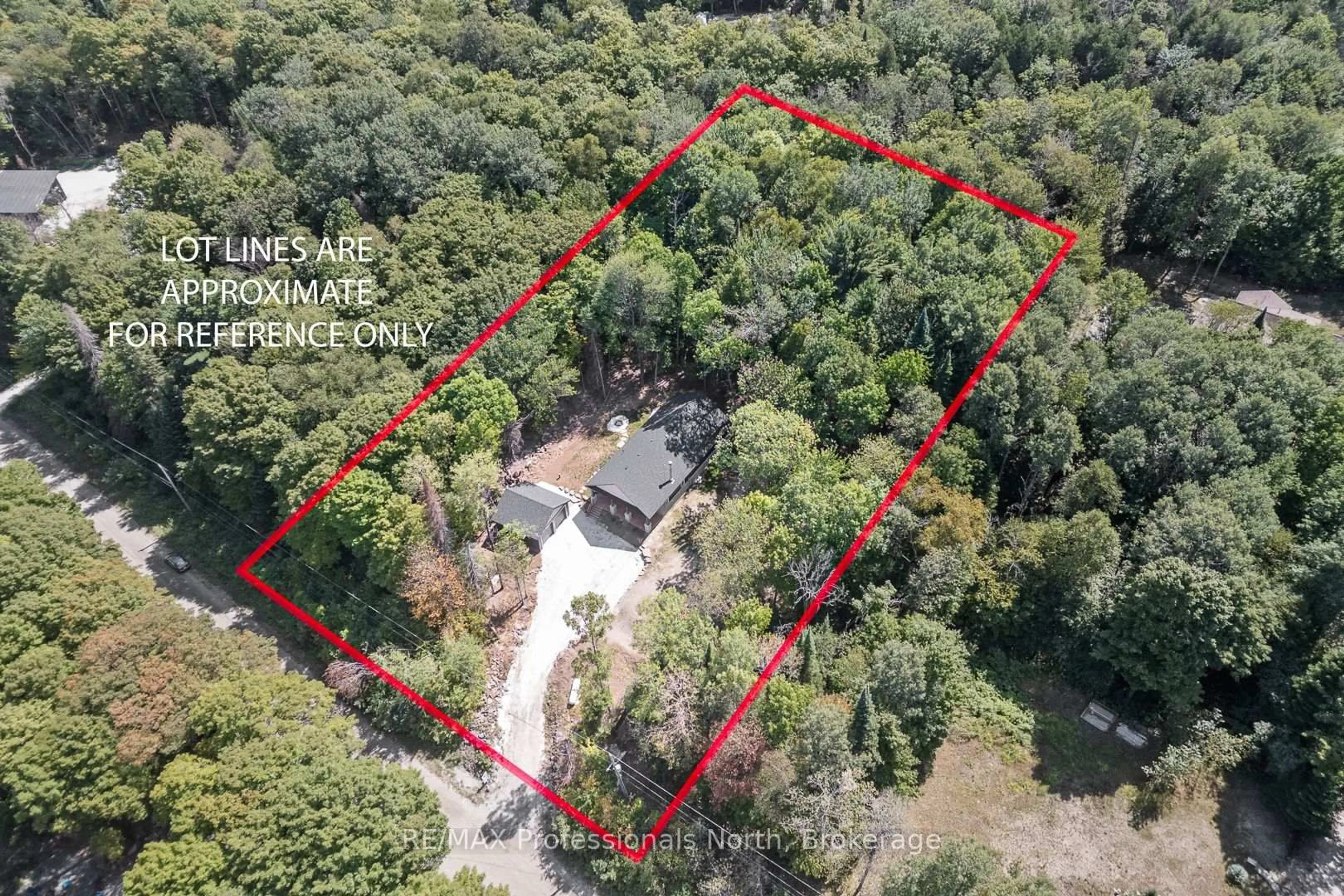 A pic from outside/outdoor area/front of a property/back of a property/a pic from drone, forest/trees view for 1076 Angel Rd, Dysart et al Ontario K0M 1M0