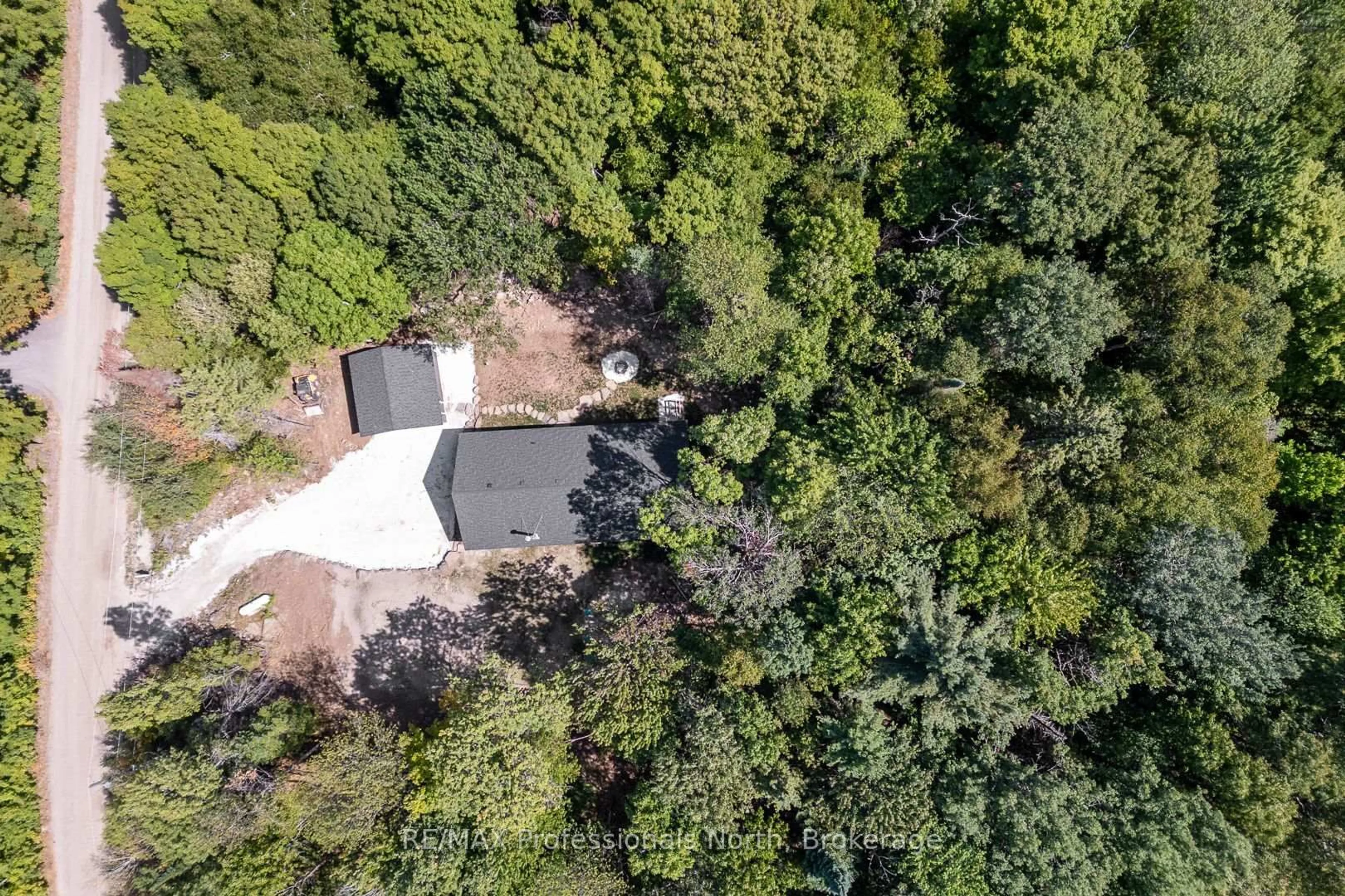 A pic from outside/outdoor area/front of a property/back of a property/a pic from drone, forest/trees view for 1076 Angel Rd, Dysart et al Ontario K0M 1M0