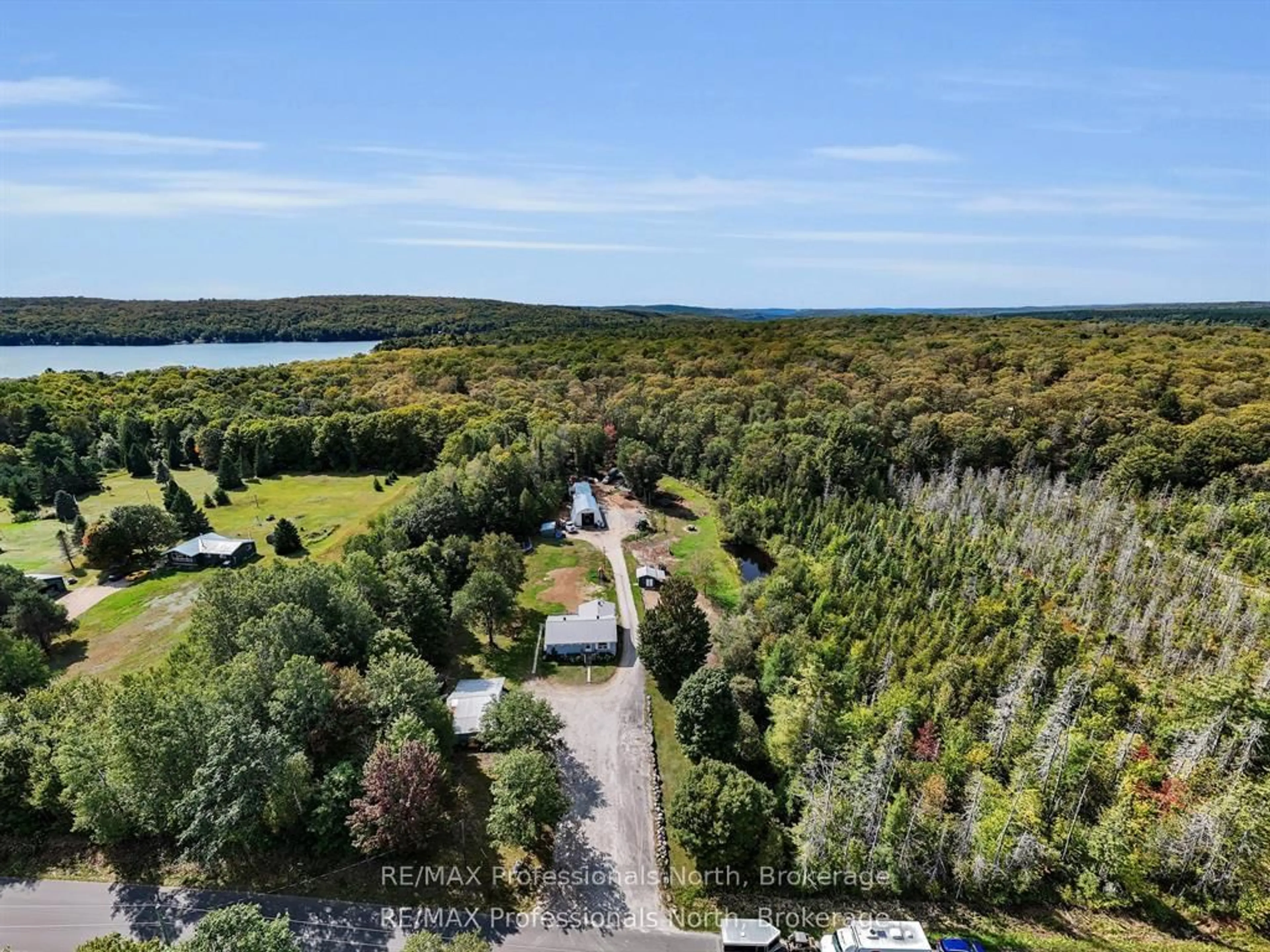 A pic from outside/outdoor area/front of a property/back of a property/a pic from drone, water/lake/river/ocean view for 1062 Skyline Dr, Armour Ontario P0A 1J0