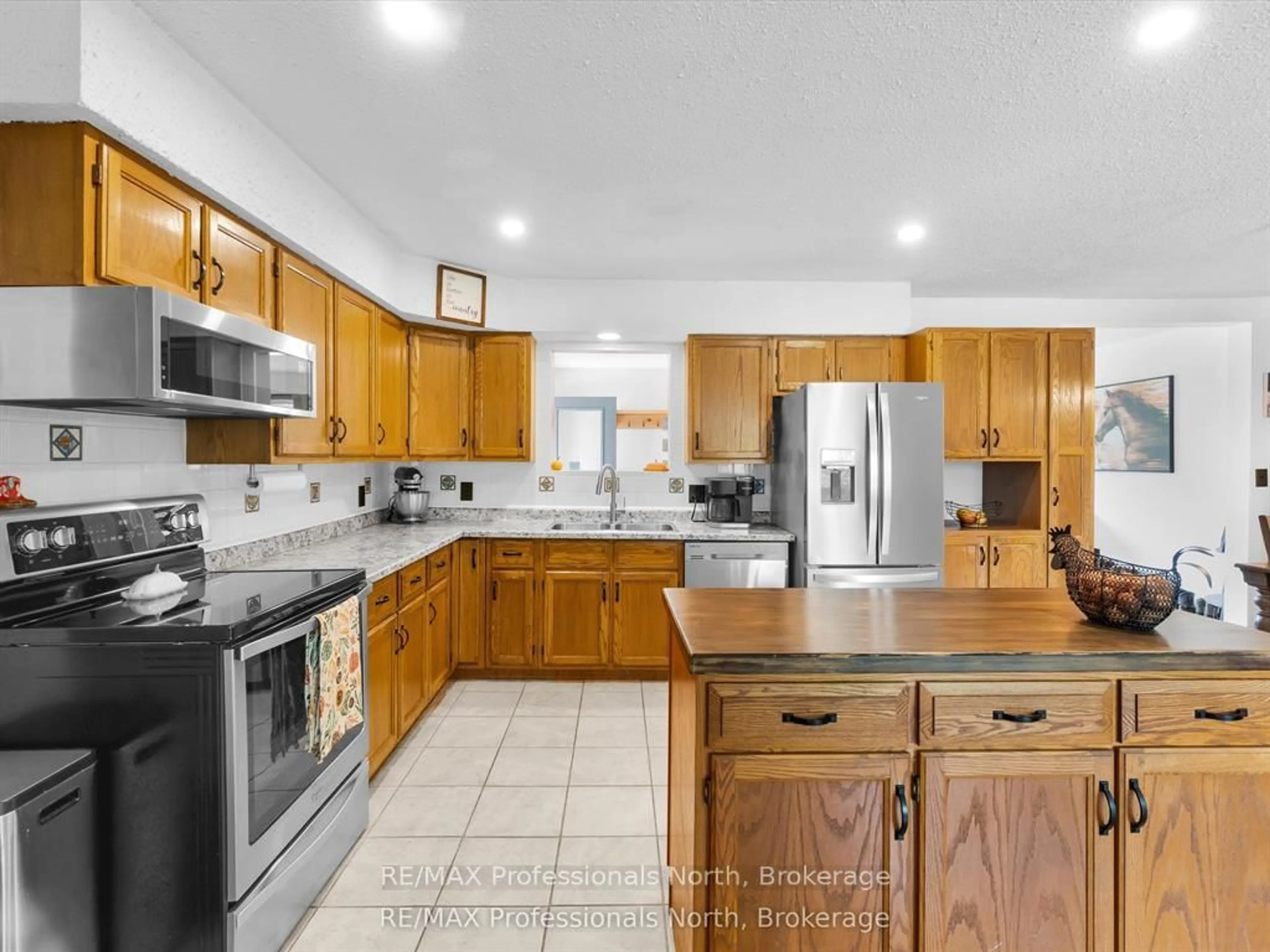 Open concept kitchen, ceramic/tile floor for 1062 Skyline Dr, Armour Ontario P0A 1J0